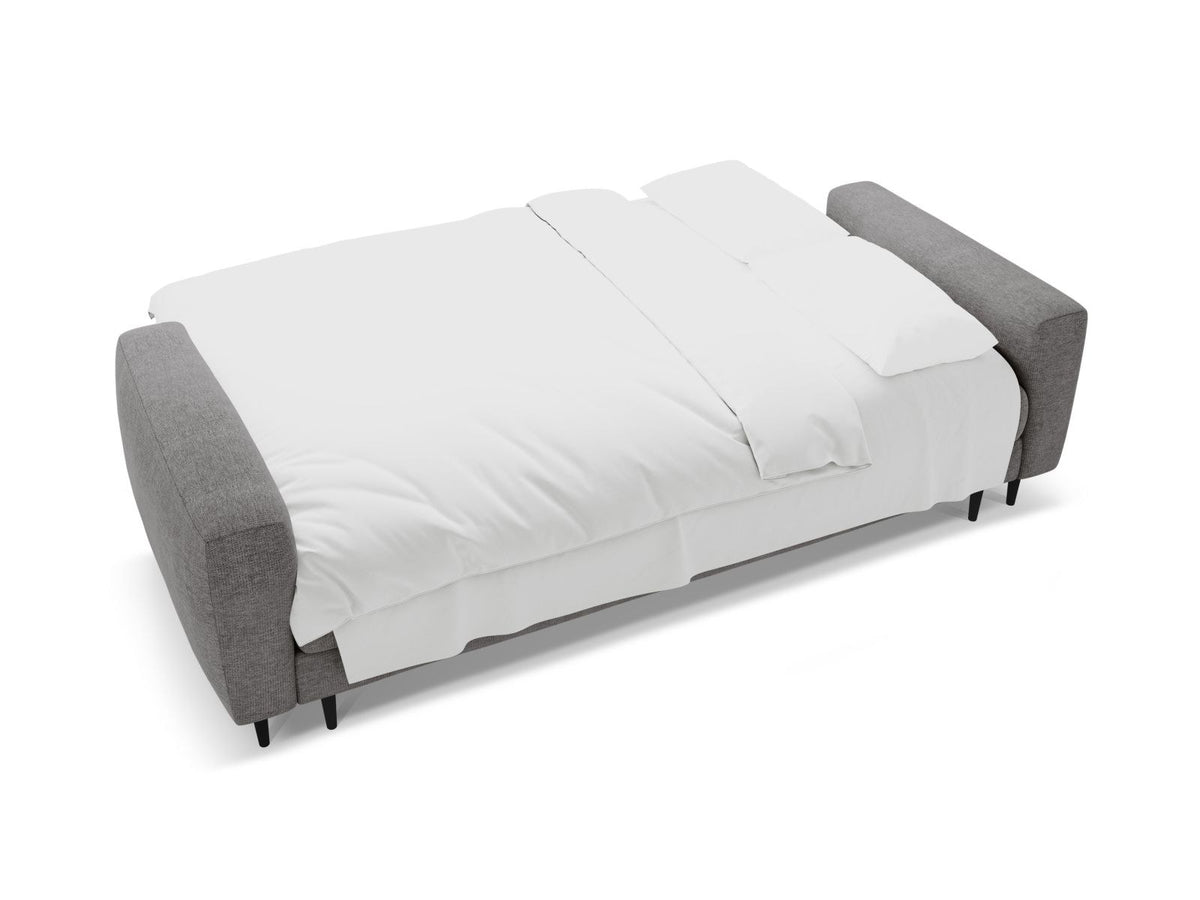 Beiges Bettsofa Lazio mit Sorella-Stoffbezug, Massivholzrahmen, schwarzen Metallbeinen und ausklappbarer Liegefläche samt Bettkasten.