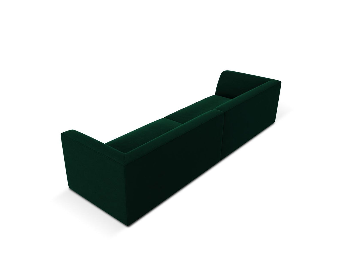 Beige-farbenes 4er Sofa Siena mit Samtbezug, schwarzen Kunststoffbeinen und gepolsterter Rückenlehne, Frontalansicht auf hellem Hintergrund.