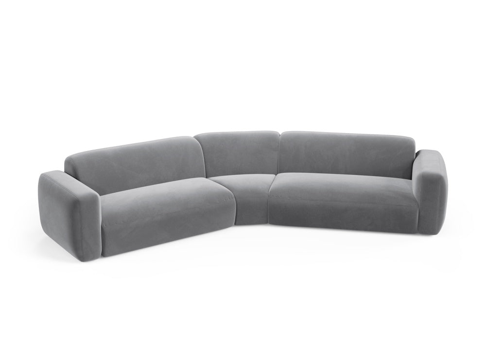 Modulares Ecksofa in edlem Strino Velour, symmetrisches Design in Grau, perfekt für moderne Wohnkonzepte von Cosmopolitan Design.