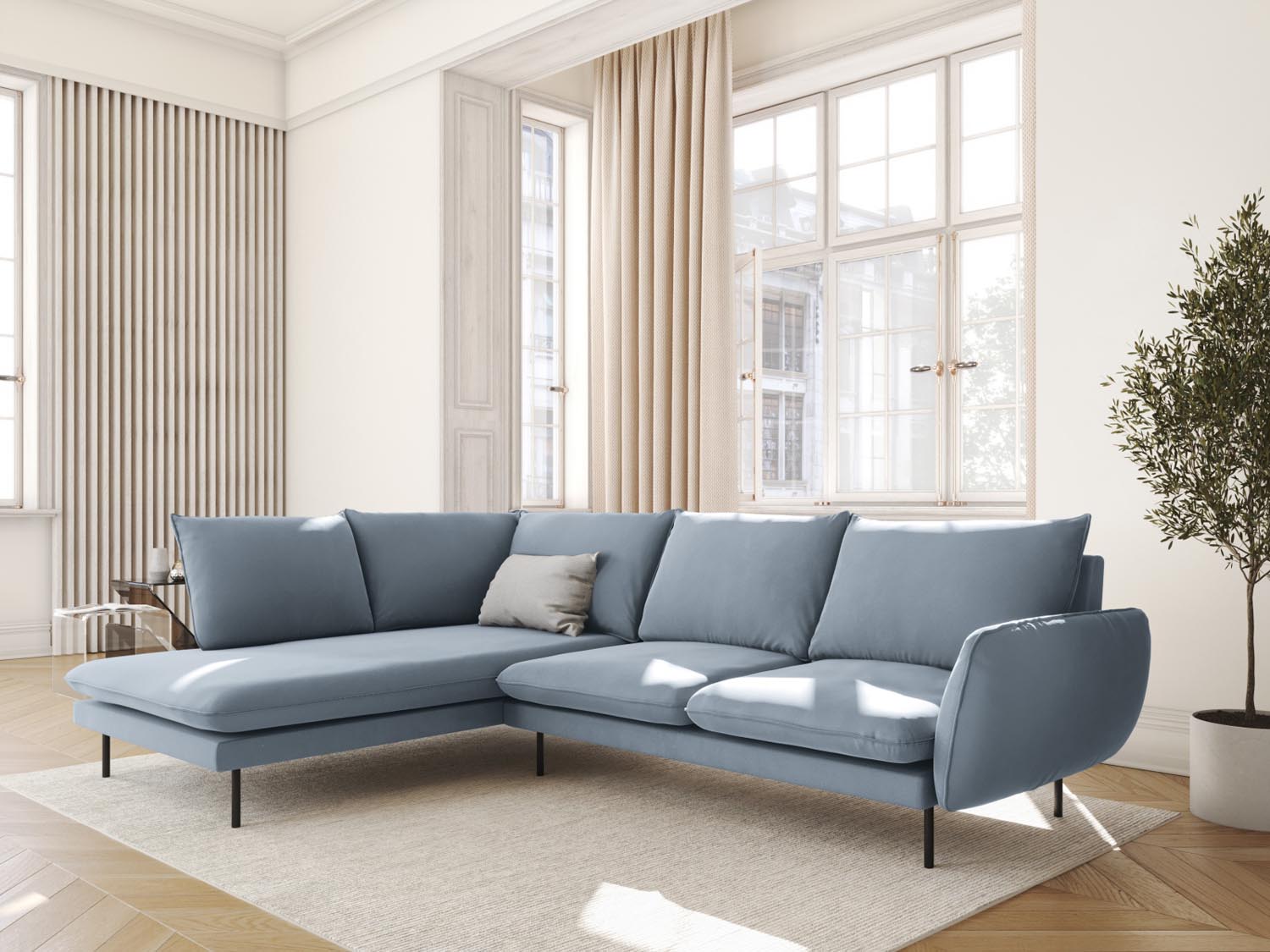 Elegantes Vienna Velour Ecksofa links in sanftem Hellblau und Schwarz-Bluvel, ideal für stilvolle Wohnräume.