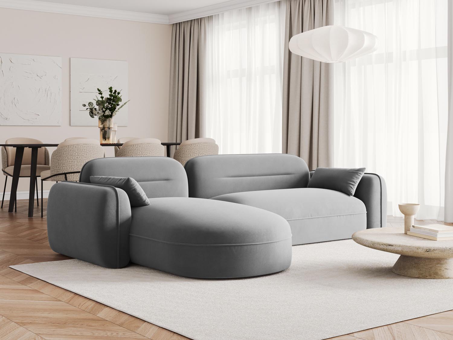 Modulares Ecksofa Sydney in sanftem Grau, perfekt für gemütliche Wohnzimmer, bietet großzügigen Platz und zeitgemäße Eleganz.