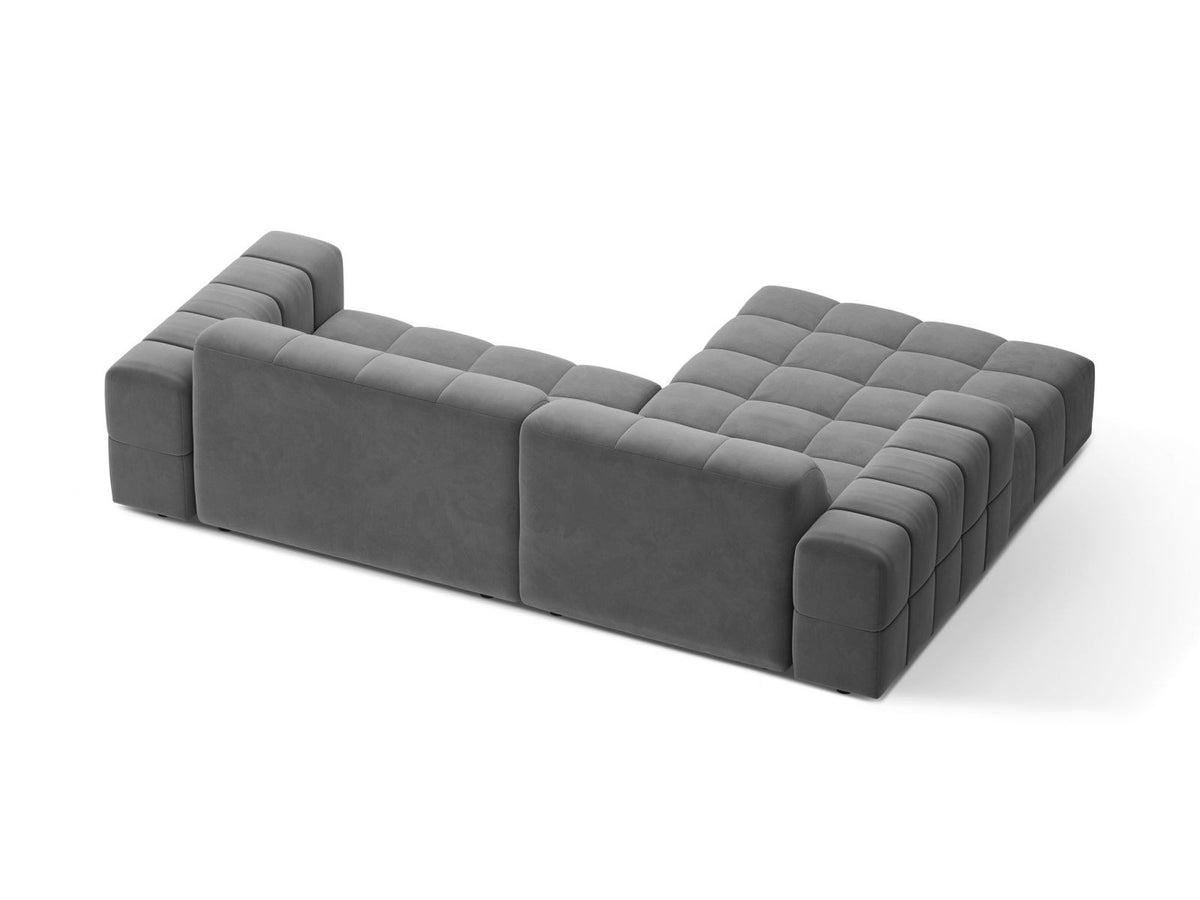 Ecksofa links Chicago in dunkelgrünem Samtstoff mit schwarzen Kunststoffbeinen, Massivholzrahmen und markanter Récamiere-Form.