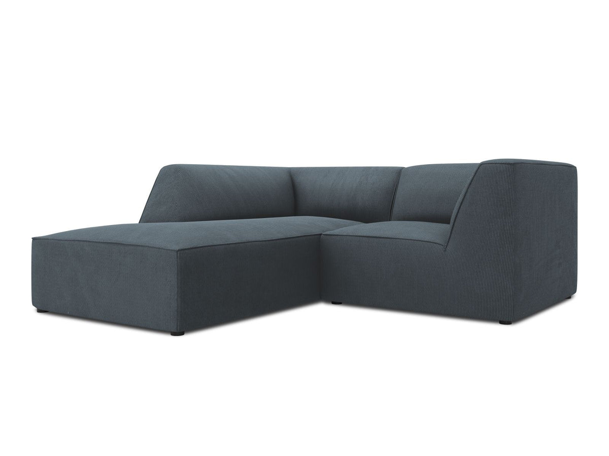 Modulares Ecksofa Siena mit gelbem Ottawa-Stoffbezug, schwarzen Kunststoffbeinen und Récamiere, Ansicht von vorne im Wohnraum.