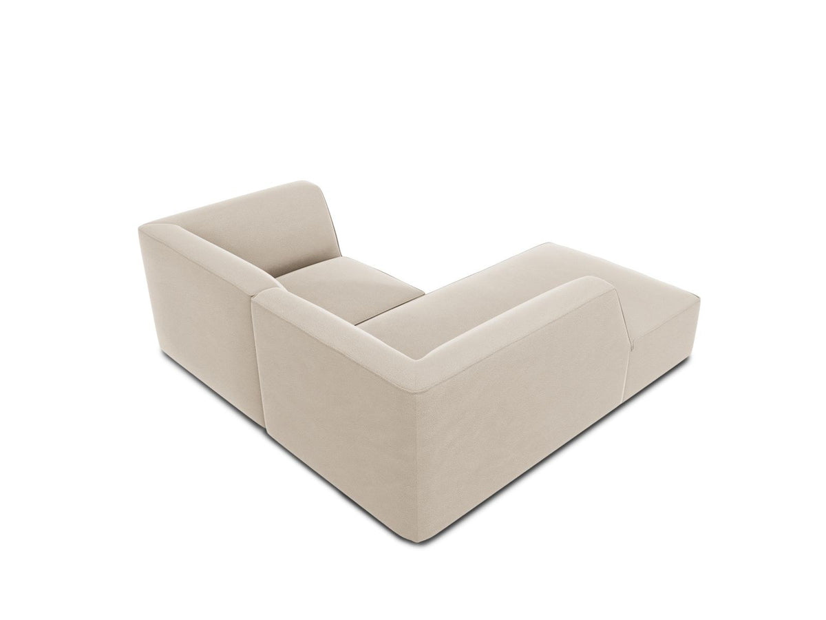 Modulares Ecksofa in Beige-Samt mit Récamiere links, Massivholzrahmen, schwarzen Kunststoffbeinen und weicher Samtpolsterung.
