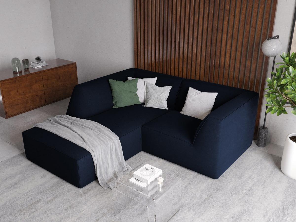 Modulares Ecksofa in Beige-Samt mit Récamiere links, Massivholzrahmen, schwarzen Kunststoffbeinen und weicher Samtpolsterung.