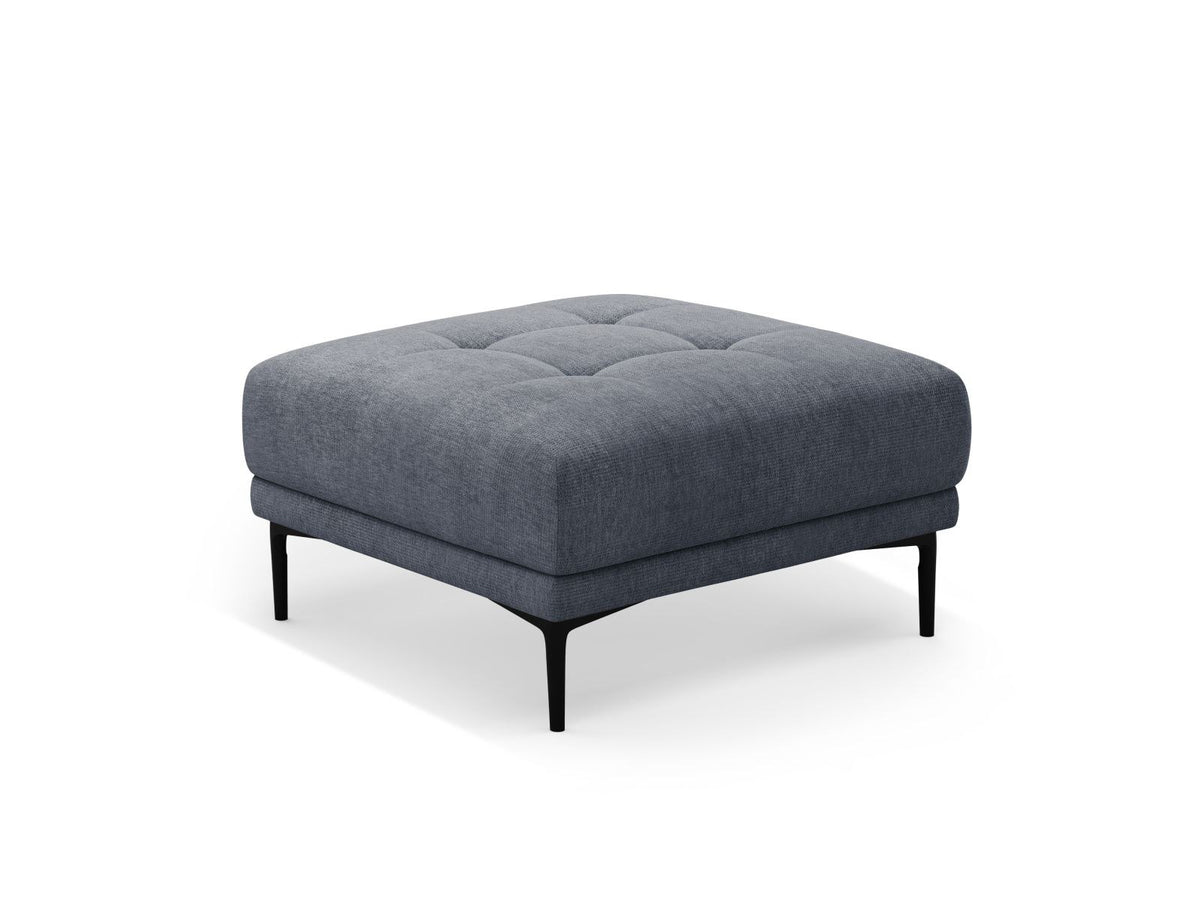 Runder Pouf mit beigem Sorella-Strukturstoff, gepolstertem Sitz und schwarzen Metallbeinen, freistehend fotografiert vor neutralem Hintergrund.