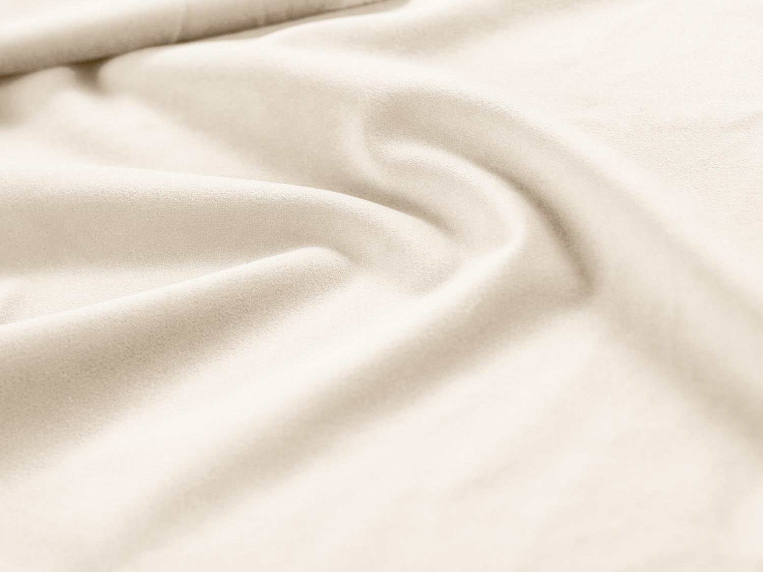 Stylischer Vienna Velour Pouf mit 80 cm Durchmesser in zartem Beige, perfekt für moderne Interiors und gemütliche Sitzgelegenheiten.