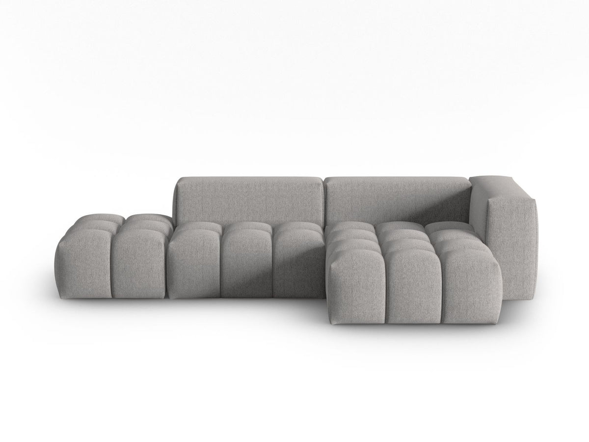 Modulares Ecksofa Verona in Beige-Sorella mit Massivholzrahmen, schwarzen Kunststoffbeinen und strukturiertem Tweed-Stoffbezug, rechte Ausrichtung.
