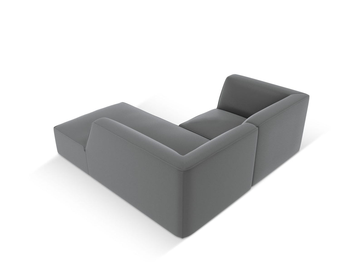 Modulares Ecksofa rechts mit Kunstlederbezug in Light Brown, Sitzfläche und Récamiere sichtbar, schwarze Kunststoffbeine, urbanes Design.