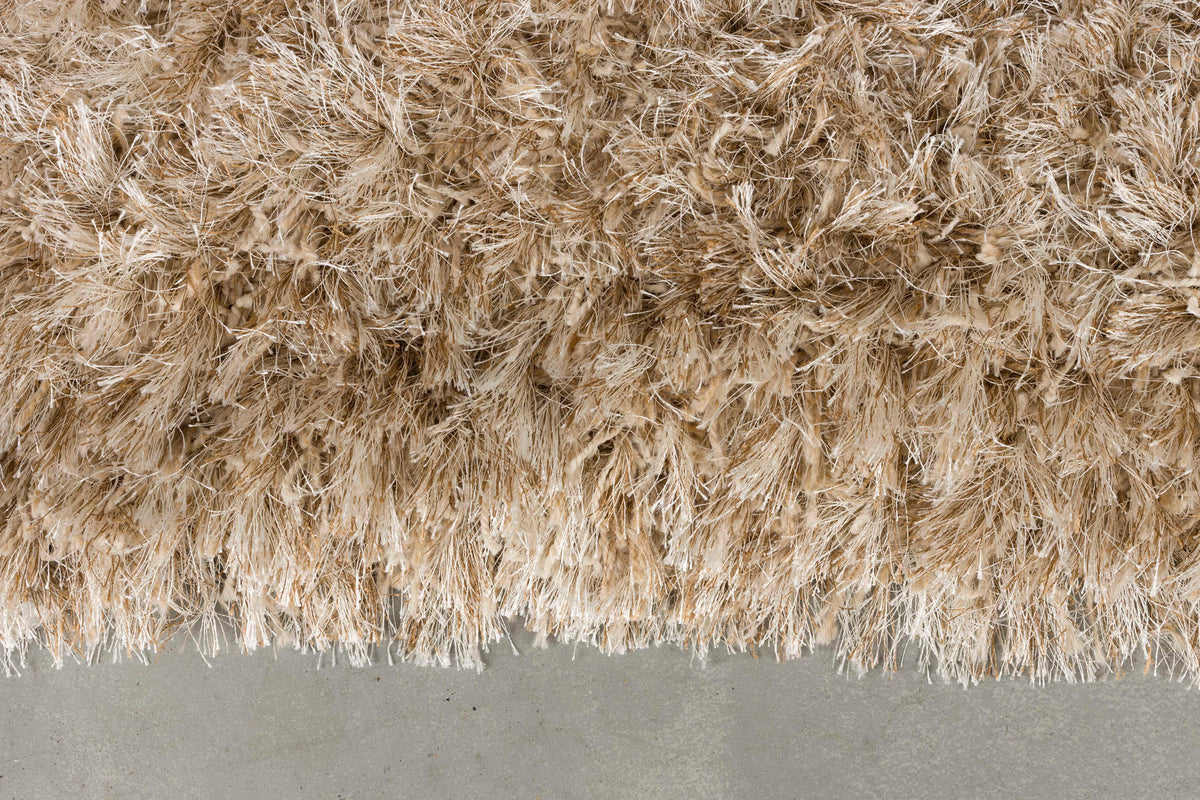 Teppich Hairy 160x230 in Beige präsentiert im Onlineshop von KAQTU Design AG. Teppich ist von Dutchbone