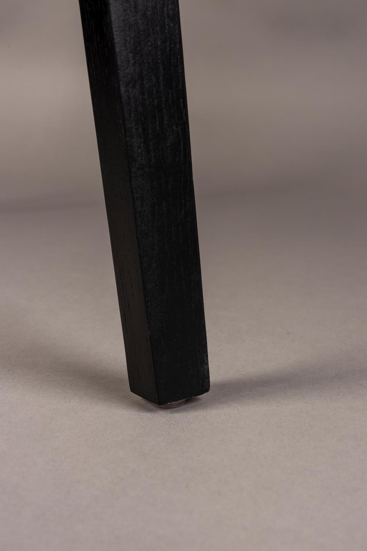 Der Stuhl Westlake von Dutchbone vereint skandinavisches Design mit höchstem Sitzkomfort und verleiht jedem Raum eine stilvolle Note.