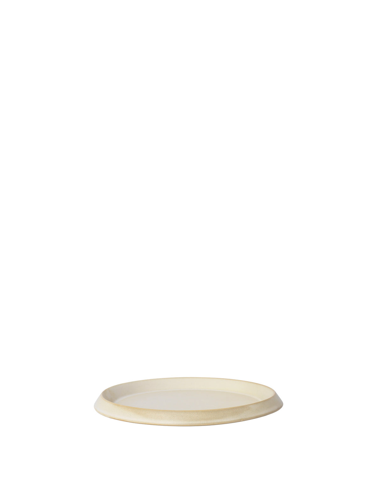 Erena Seitenplatte Ø22 in Sahne präsentiert im Onlineshop von KAQTU Design AG. Platte ist von Ferm Living