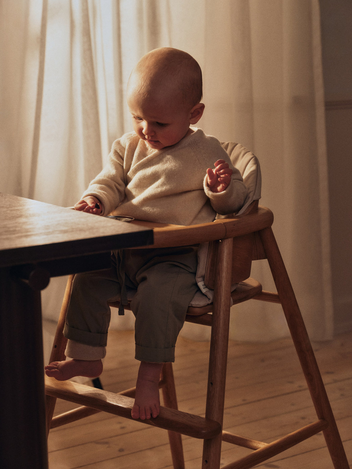 Muru High Chair Cushion in Sand präsentiert im Onlineshop von KAQTU Design AG. Sitzkissen ist von Ferm Living