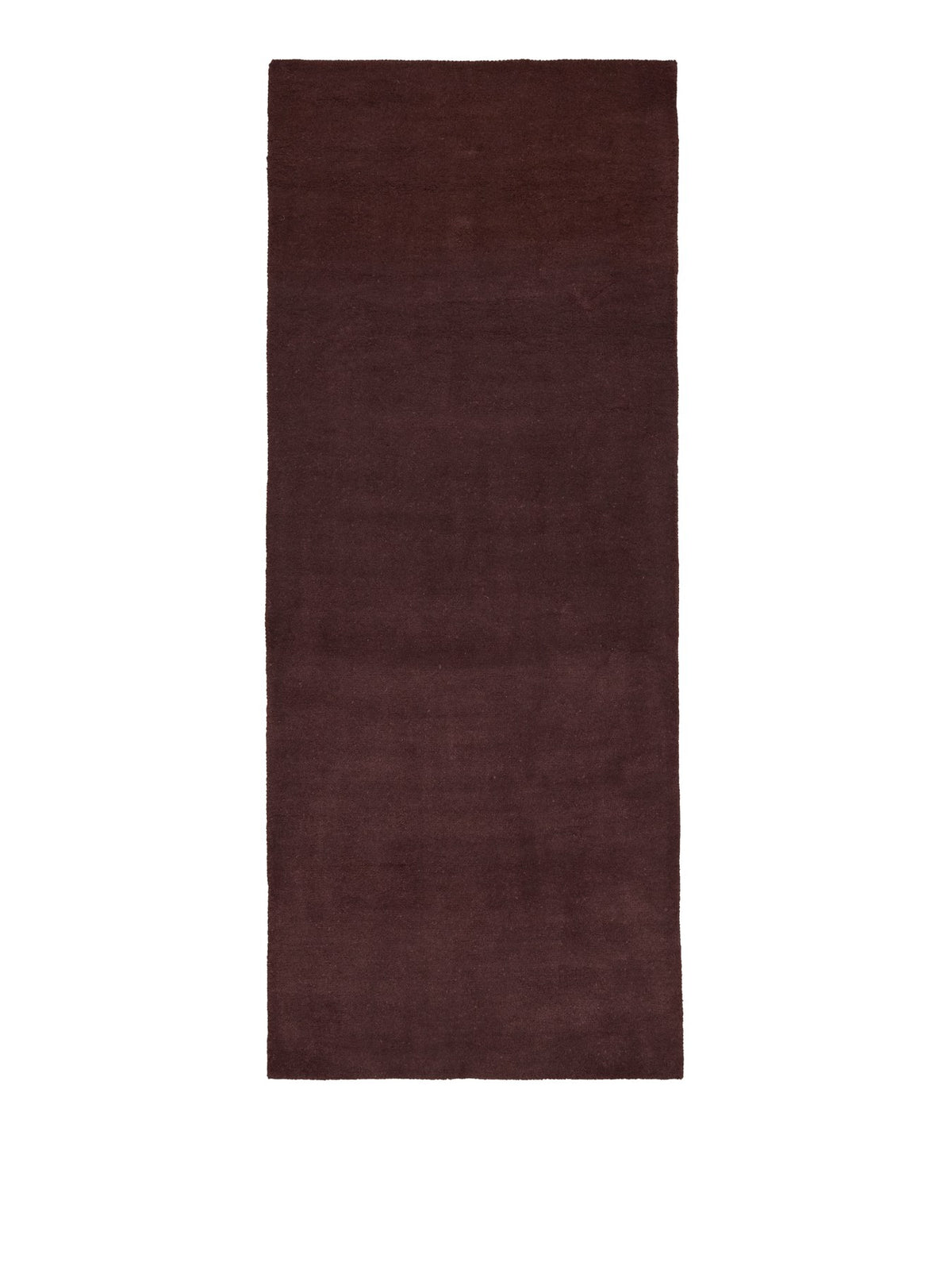Getufteter Läufer von Ferm Living in Rotbraun, Vorderseite aus neuseeländischer Wolle, Rückseite aus Baumwolle, Format 80 x 200 cm.