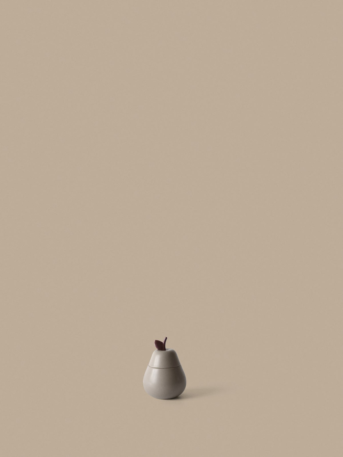 Birnenförmiger Keramikbehälter von Ferm Living aus glasiertem Steinzeug in der Farbe Cashmere, Durchmesser 9.5 cm, Höhe 13 cm.
