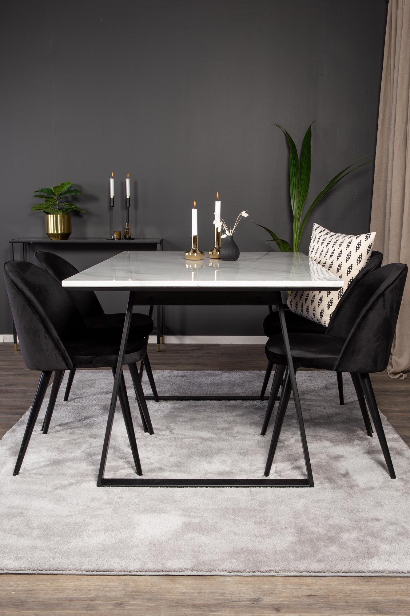 Estelle Esszimmerset: Moderner Esstisch und luxuriöse Velvet-Stühle für gesellige Abende und unvergessliche Momente.