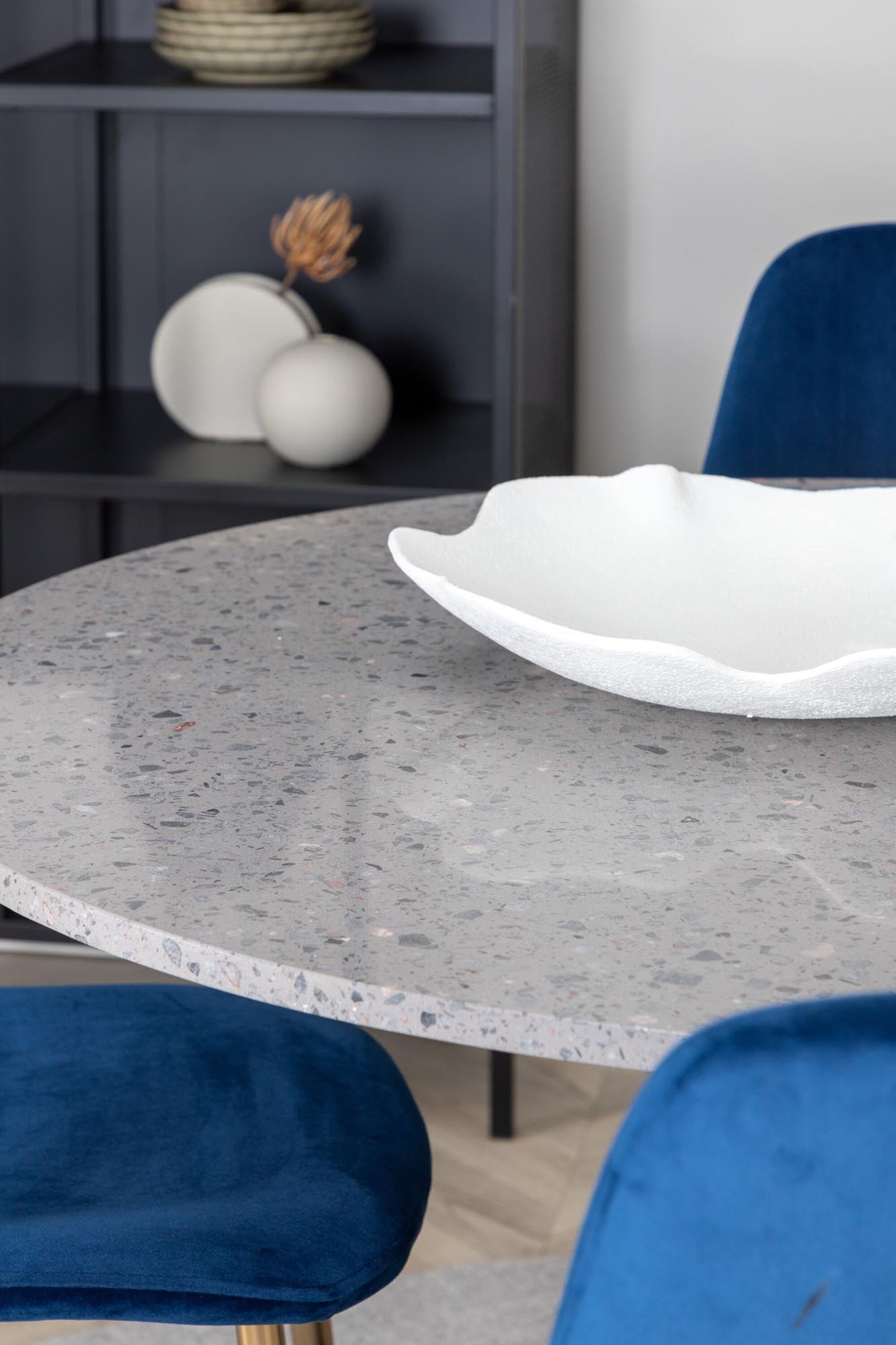 Razzia Esszimmerset + Polar: Eleganter runder Tisch mit marmorierter Oberfläche und luxuriösen Samtstühlen für stilvolle Esszimmer.