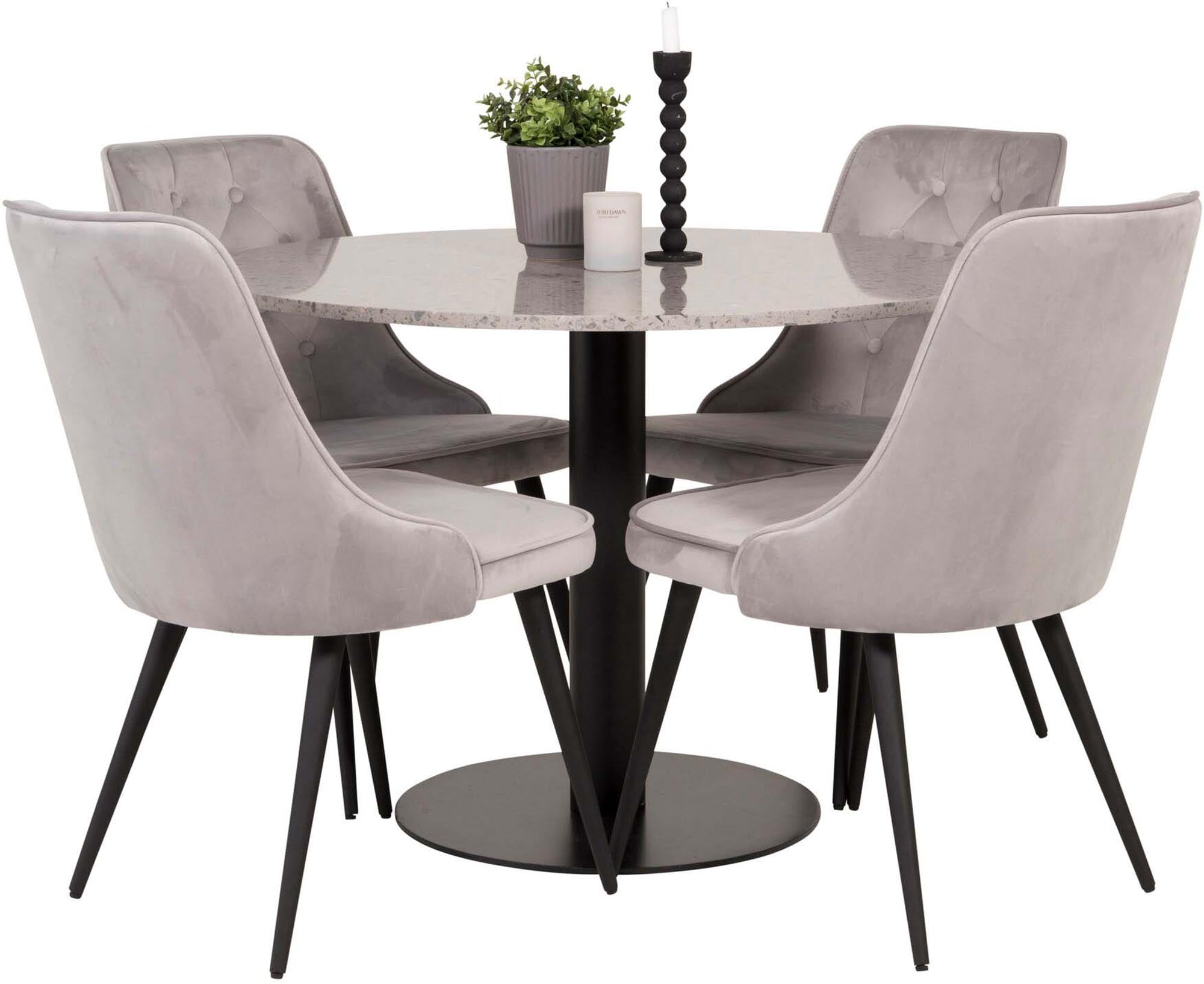 Luxuriöses Esszimmerset mit Samt für exklusives Wohnambiente.