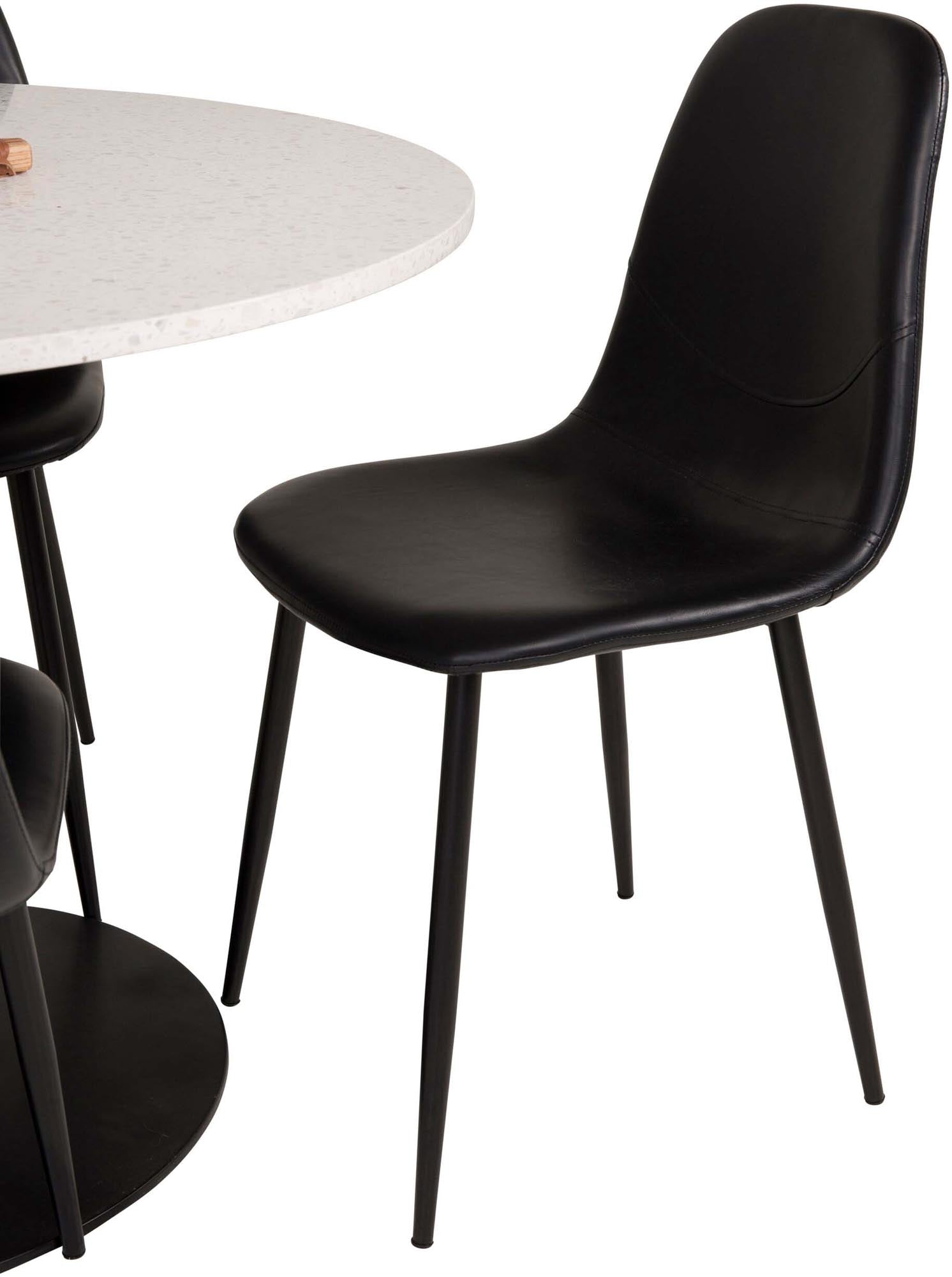 Erleben Sie das Razzia Esszimmerset von Venture Home: stilvoller runder Tisch mit robuster Marmoroberfläche und luxuriösen Samtstühlen für Ihr modernes Zuhause.