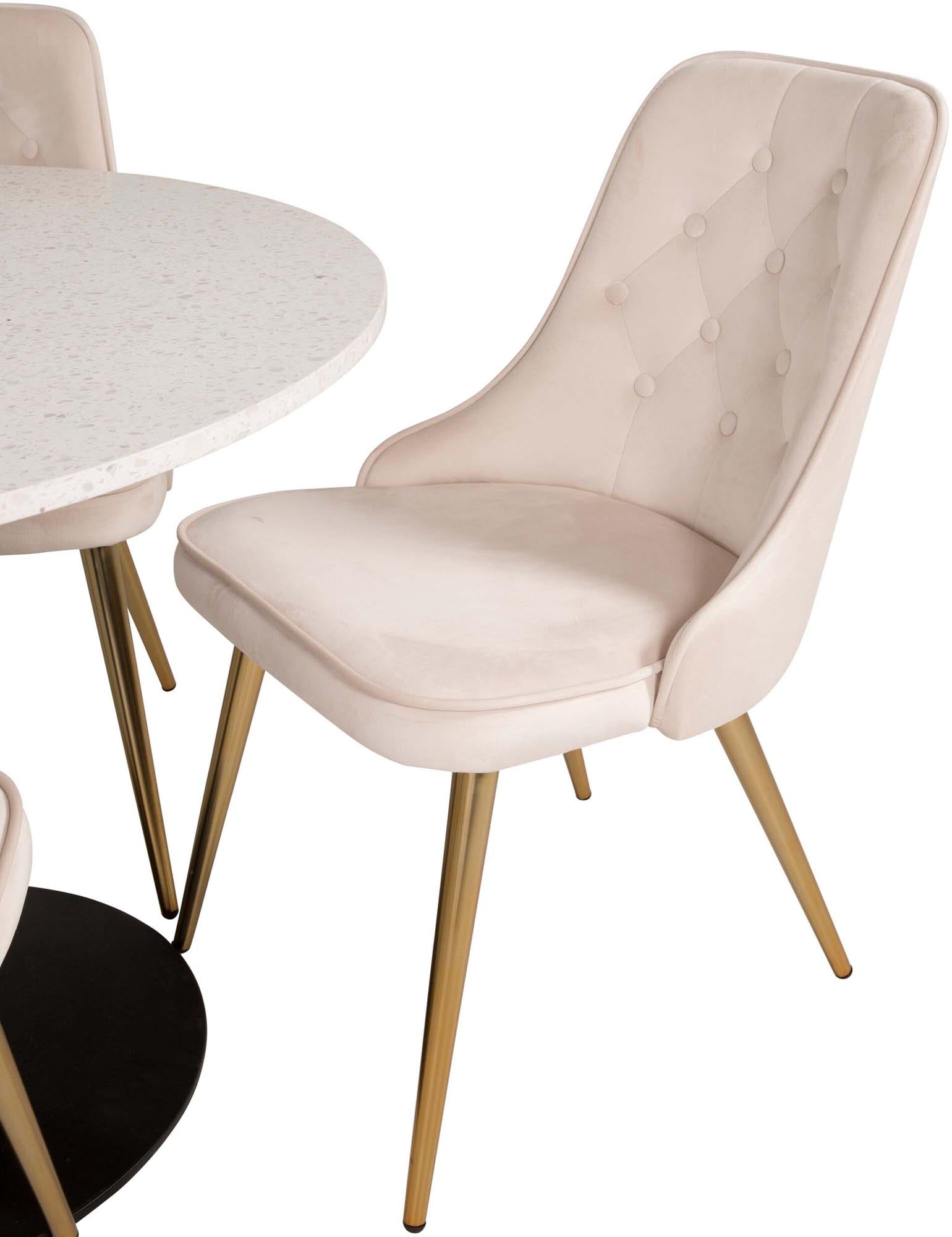 Stilvolles Esszimmerset mit luxuriösen Samtstühlen und einem eleganten runden Tisch, ideal für gesellige Anlässe und gemütliche Mahlzeiten.