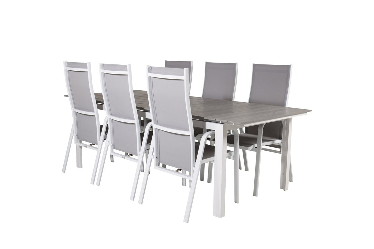 Gartentischset mit ausziehbarem Levels Esstisch aus Aluminium und Aintwood sowie acht stapelbaren Copacabana Stühlen mit grauem Textilene-Bezug.