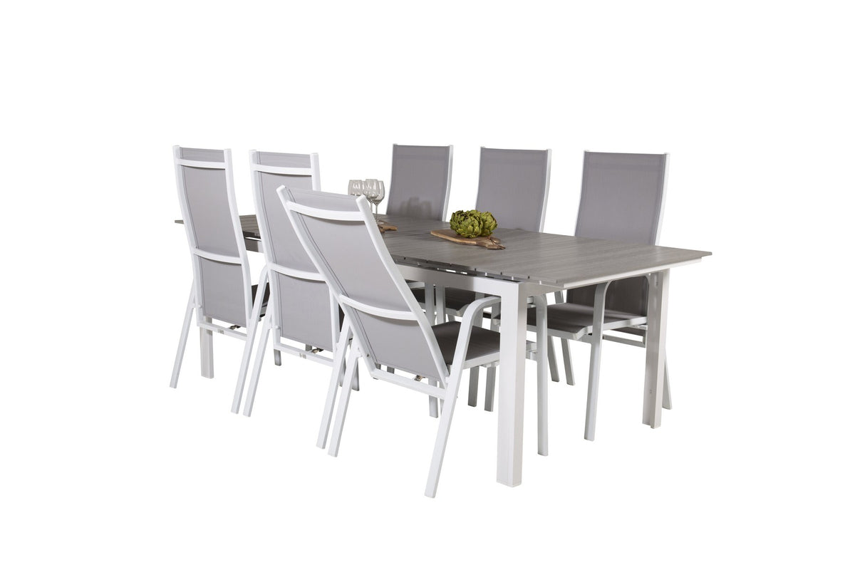 Gartentischset mit ausziehbarem Levels Esstisch aus Aluminium und Aintwood sowie acht stapelbaren Copacabana Stühlen mit grauem Textilene-Bezug.