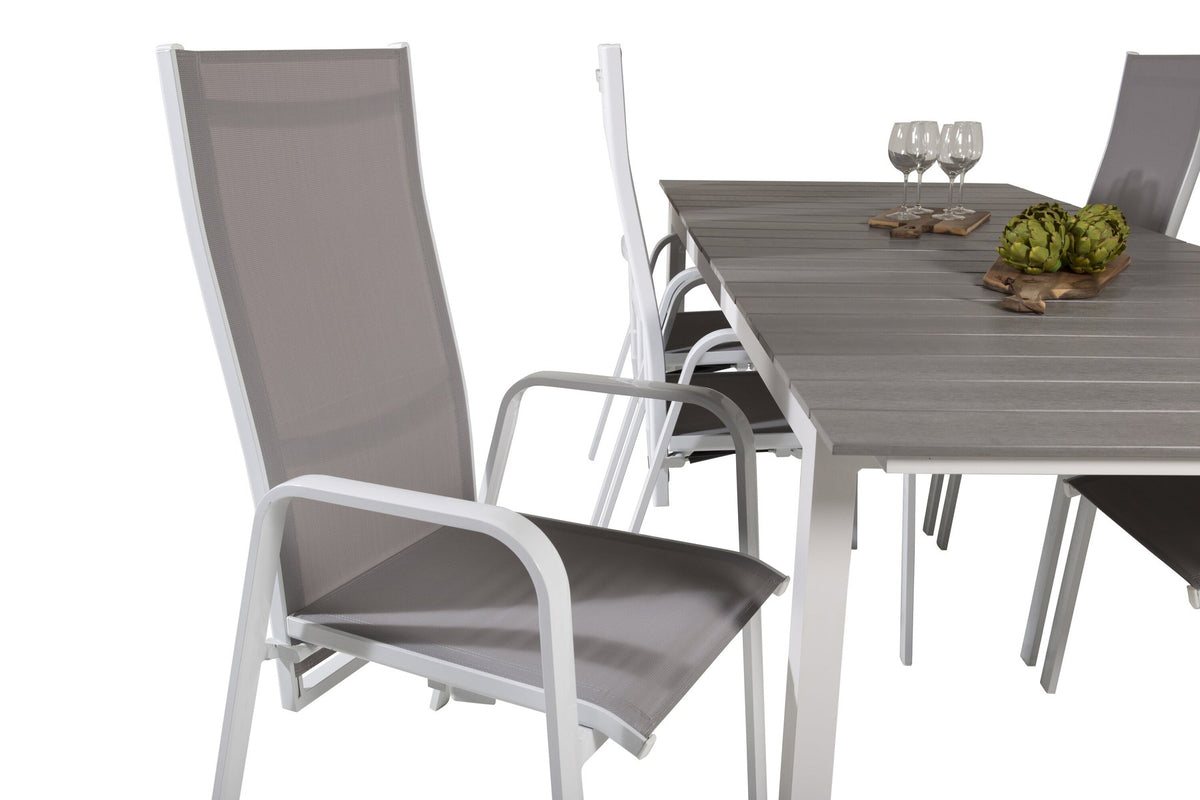 Gartentischset mit ausziehbarem Levels Esstisch aus Aluminium und Aintwood sowie acht stapelbaren Copacabana Stühlen mit grauem Textilene-Bezug.