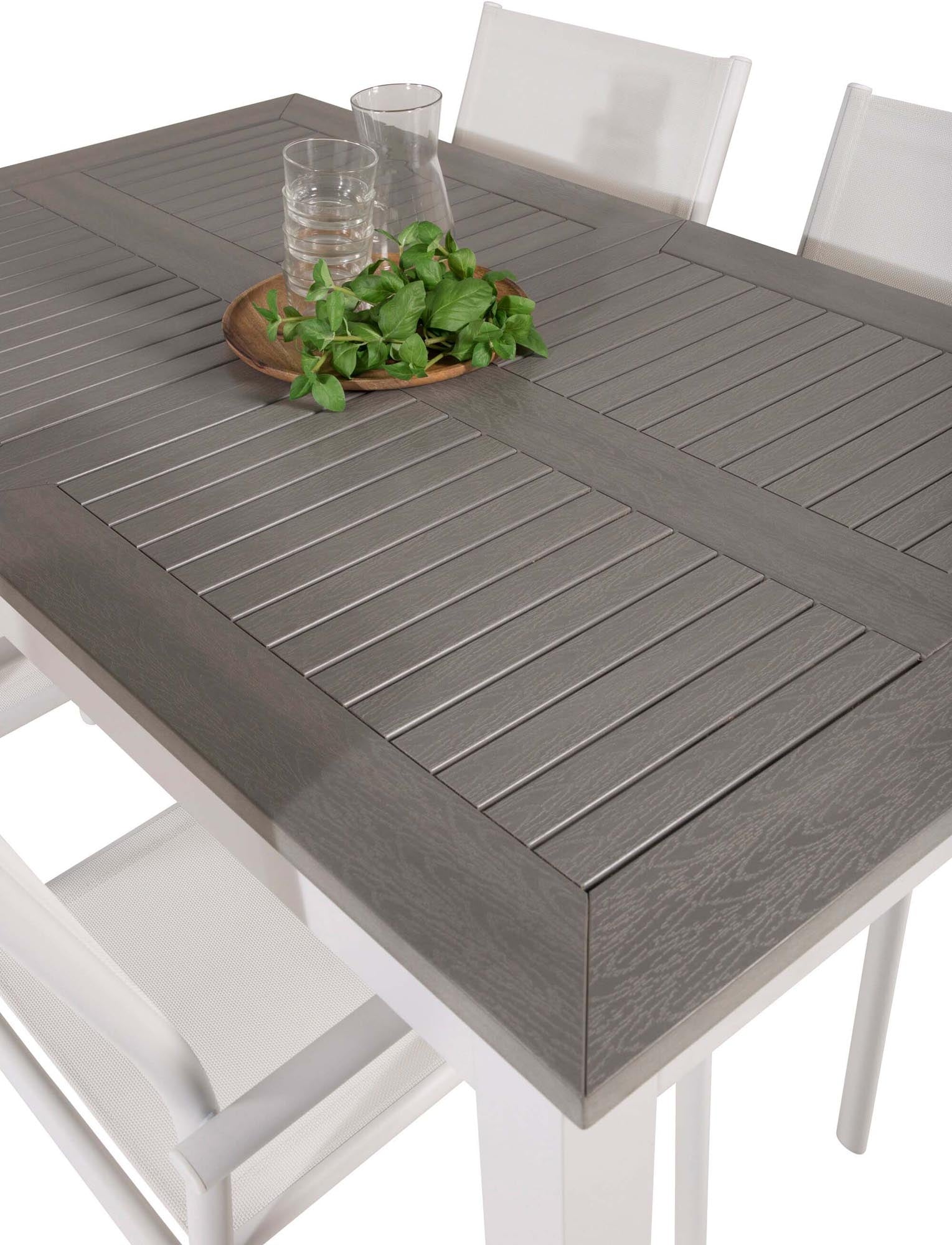 Stylisches Albany Gartentischset: Ausziehbarer Tisch und 4 komfortable Santorini Stühle für unvergessliche Outdoor-Momente.