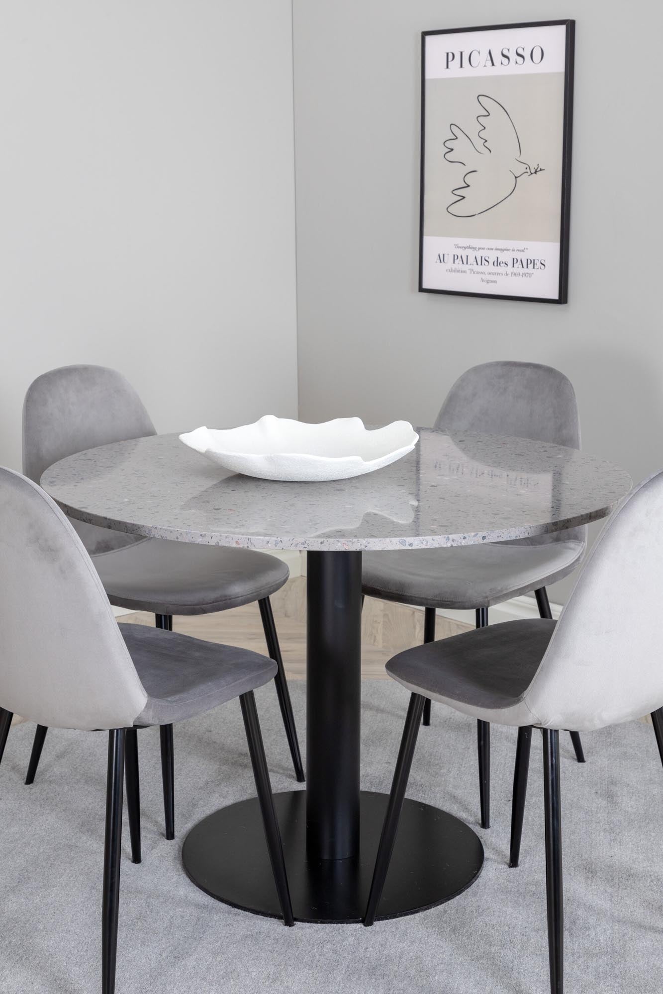 Razzia Esszimmerset + Polar: Eleganter runder Tisch mit marmorierter Oberfläche und luxuriösen Samtstühlen für stilvolle Esszimmer.