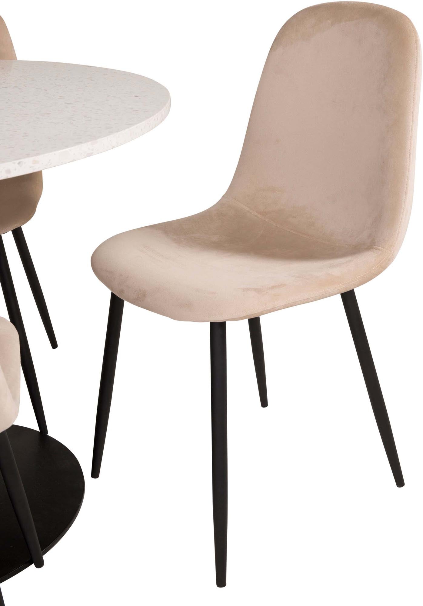 Entdecken Sie das Razzia Esszimmerset + Polar: Eleganz trifft Komfort mit einem stilvollen runden Tisch und luxuriösen Samtstühlen.