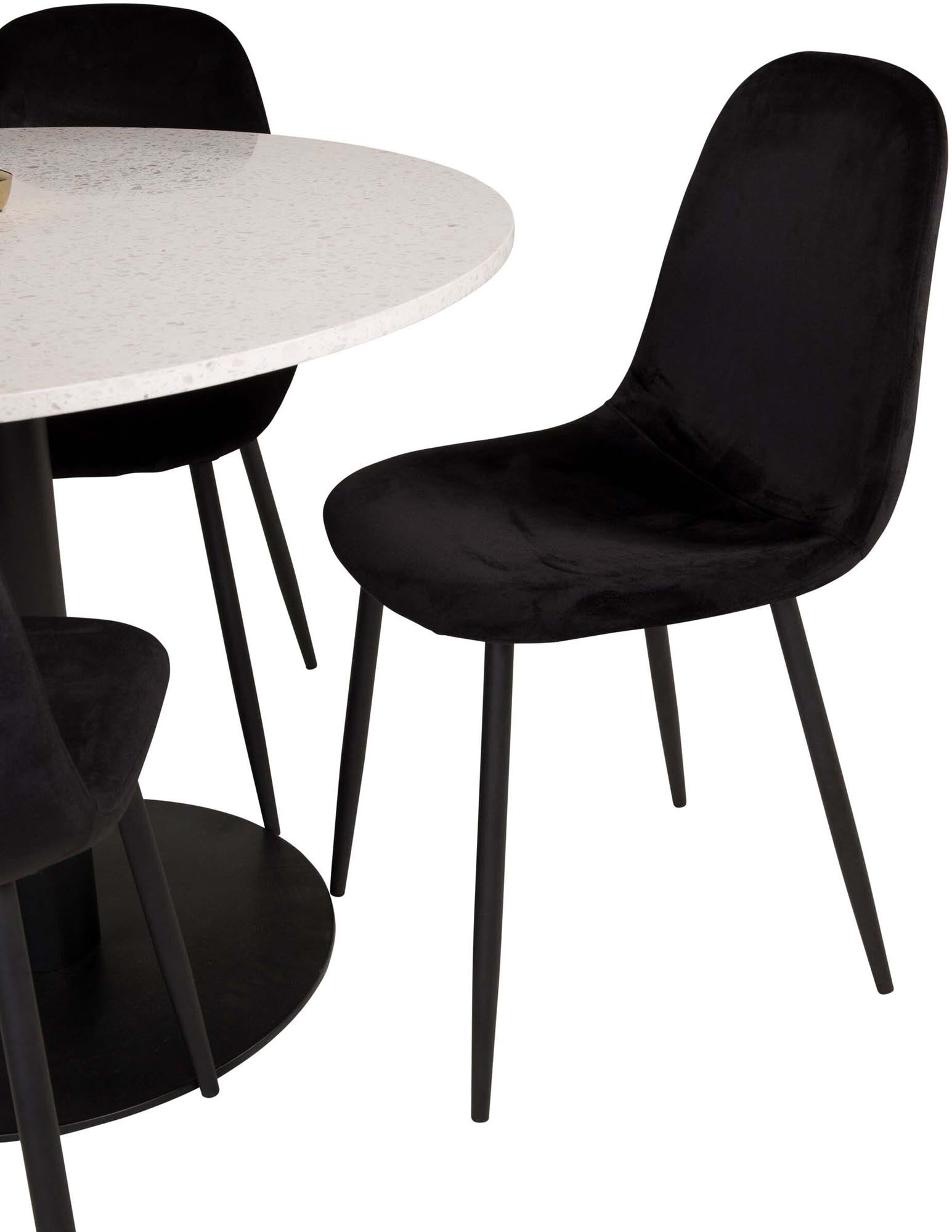 Erleben Sie das Razzia Esszimmerset + Polar von Venture Home: Ein stilvoller runder Tisch mit pflegeleichter marmorierter Platte und bequemen Samtstühlen für Ihr modernes Esszimmer.