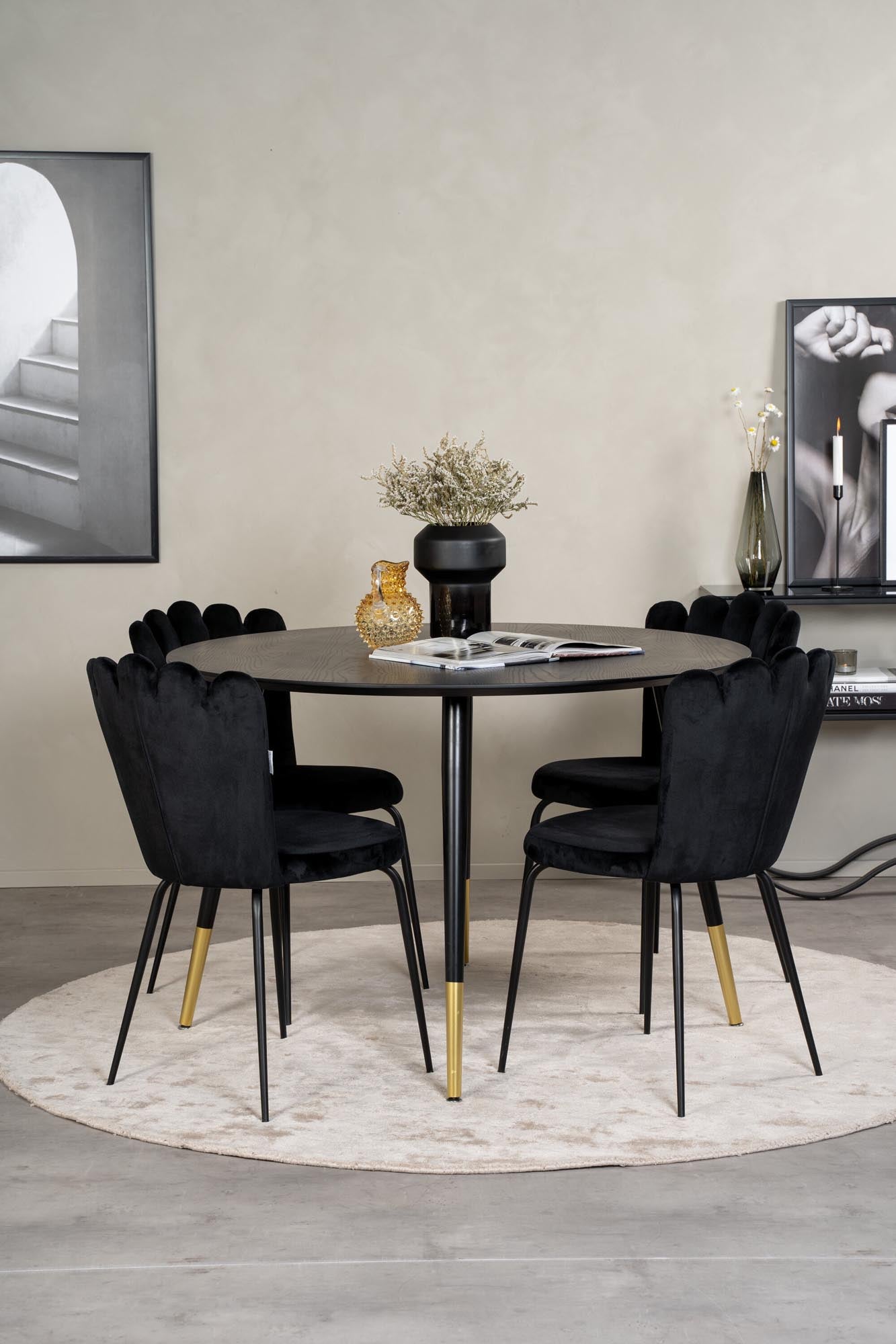 Erleben Sie das Dipp Esszimmerset + Limhamn von Venture Home: stilvoller runder Tisch mit luxuriösen Stühlen für ein modernes Esszimmer.