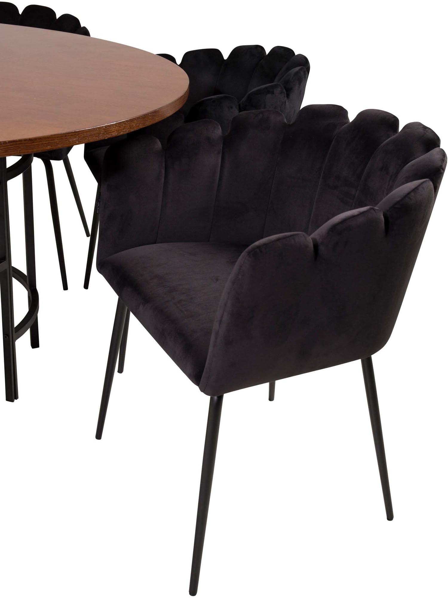 Stilvolles Esszimmerset mit schwarzem Tisch und grauen Samtstühlen, ideal für gesellige Abende.