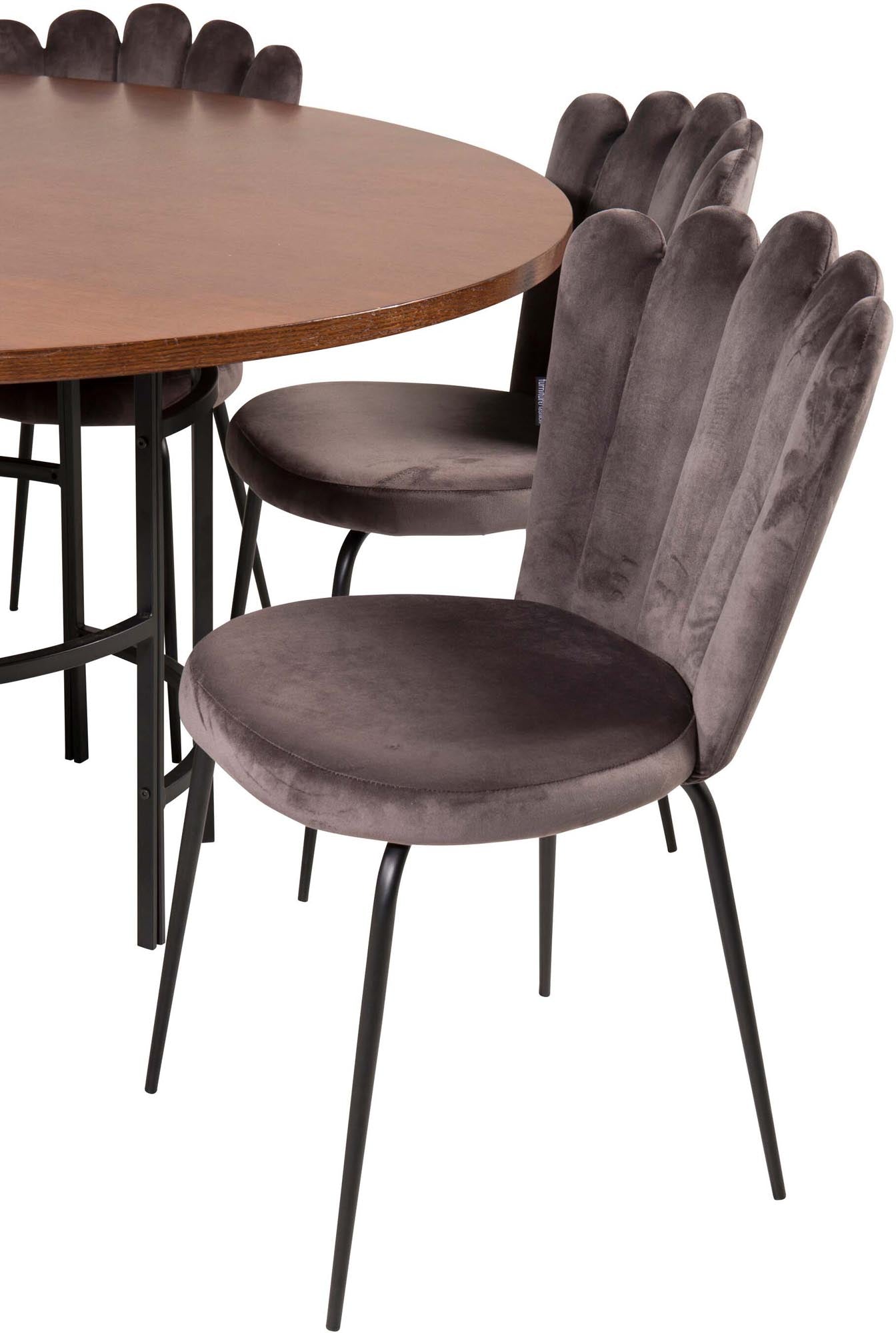 Elegantes Esszimmerset mit runden Tisch und bequemen Samtstühlen. Perfekt für gesellige Abende und stilvolle Einrichtung.