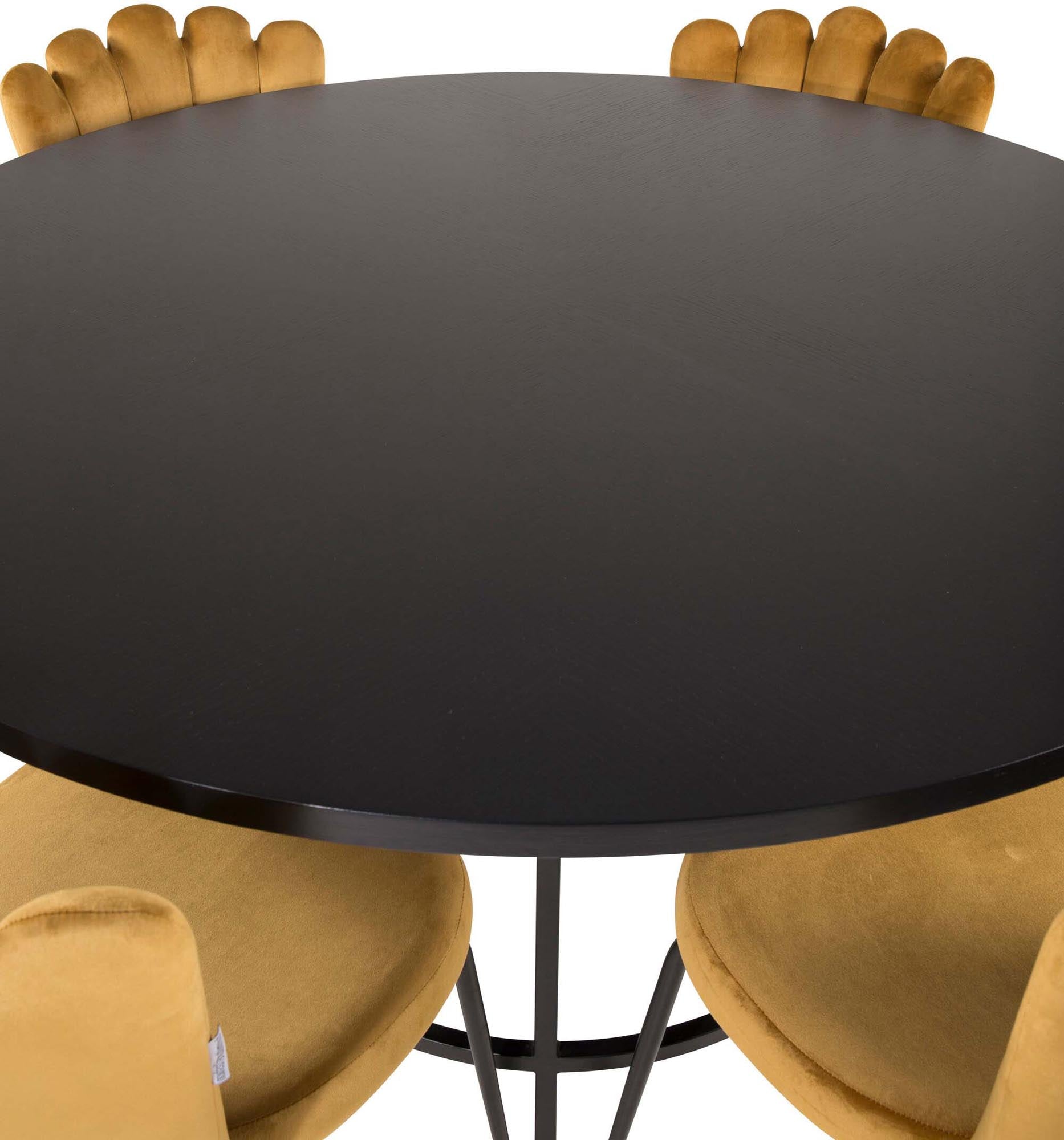 Elegantes Esszimmerset mit runden Tisch und bequemen Samtstühlen. Ideal für unvergessliche Dinnerpartys mit bis zu 6 Gästen.