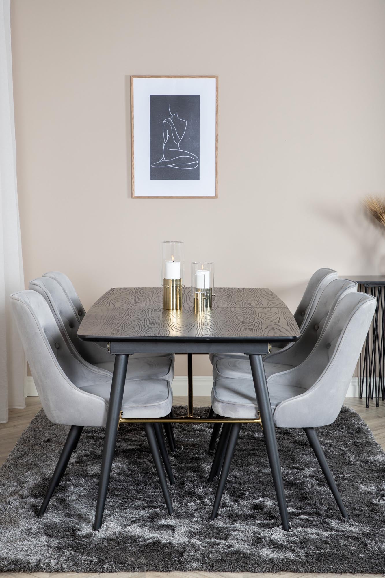 Elegantes Esszimmerset mit goldfarbenem, ausziehbarem Tisch und luxuriösen Velvet-Stühlen für unvergessliche Dinner und gemütliche Abende.