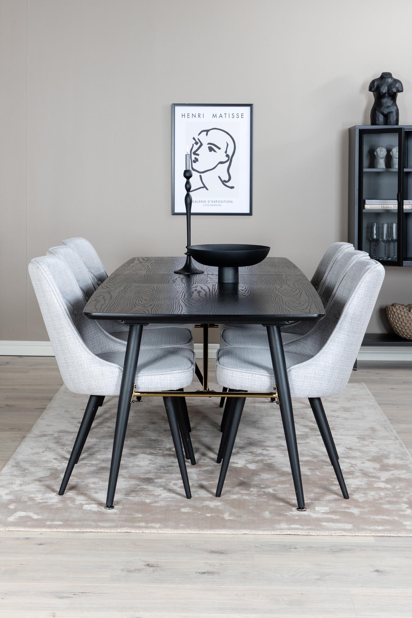 Elegantes Gold Esszimmerset mit ausziehbarem Tisch und Samtstühlen.