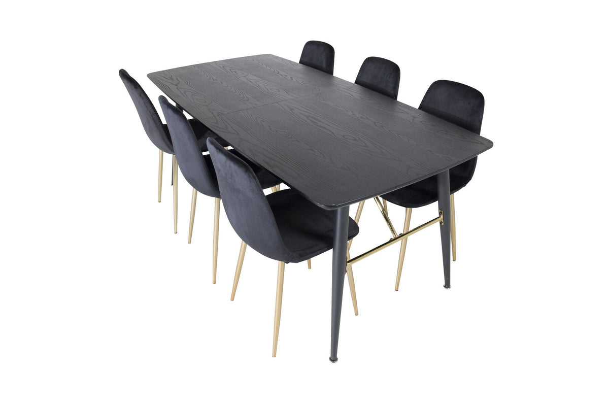 Rechteckiger Esstisch mit schwarzer MDF-Tischplatte und Stahlgestell, dazu zwei schwarze Esszimmerstühle mit gepolsterter Sitzfläche.
