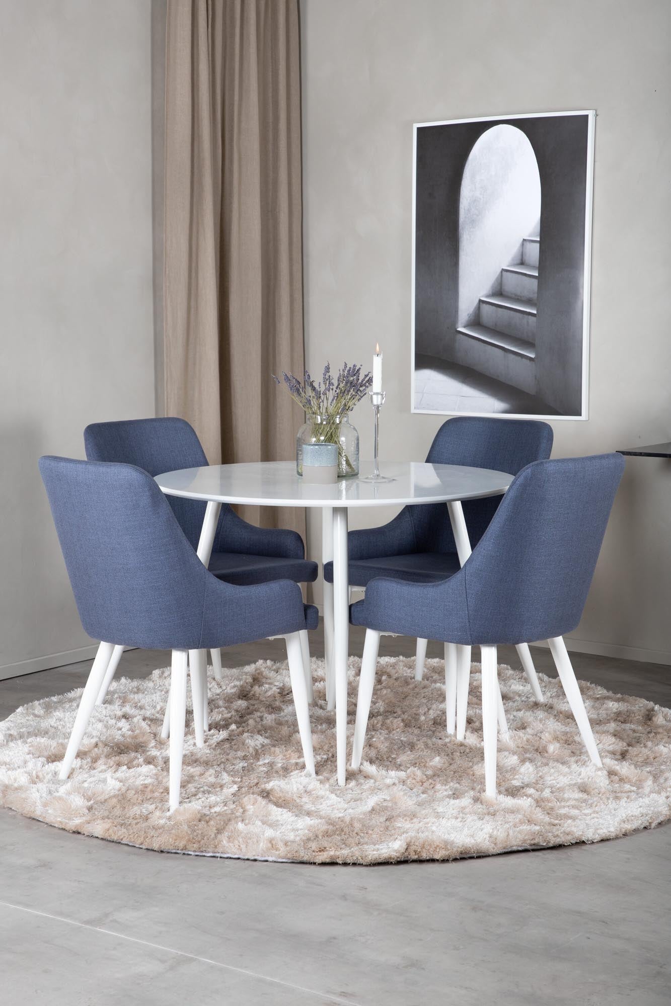 Entdecken Sie das Plaza Esszimmerset von Venture Home: runder Tisch (⌀100cm) mit 4 bequemen Stühlen, ideal für stilvolle Dinner und gesellige Runden.