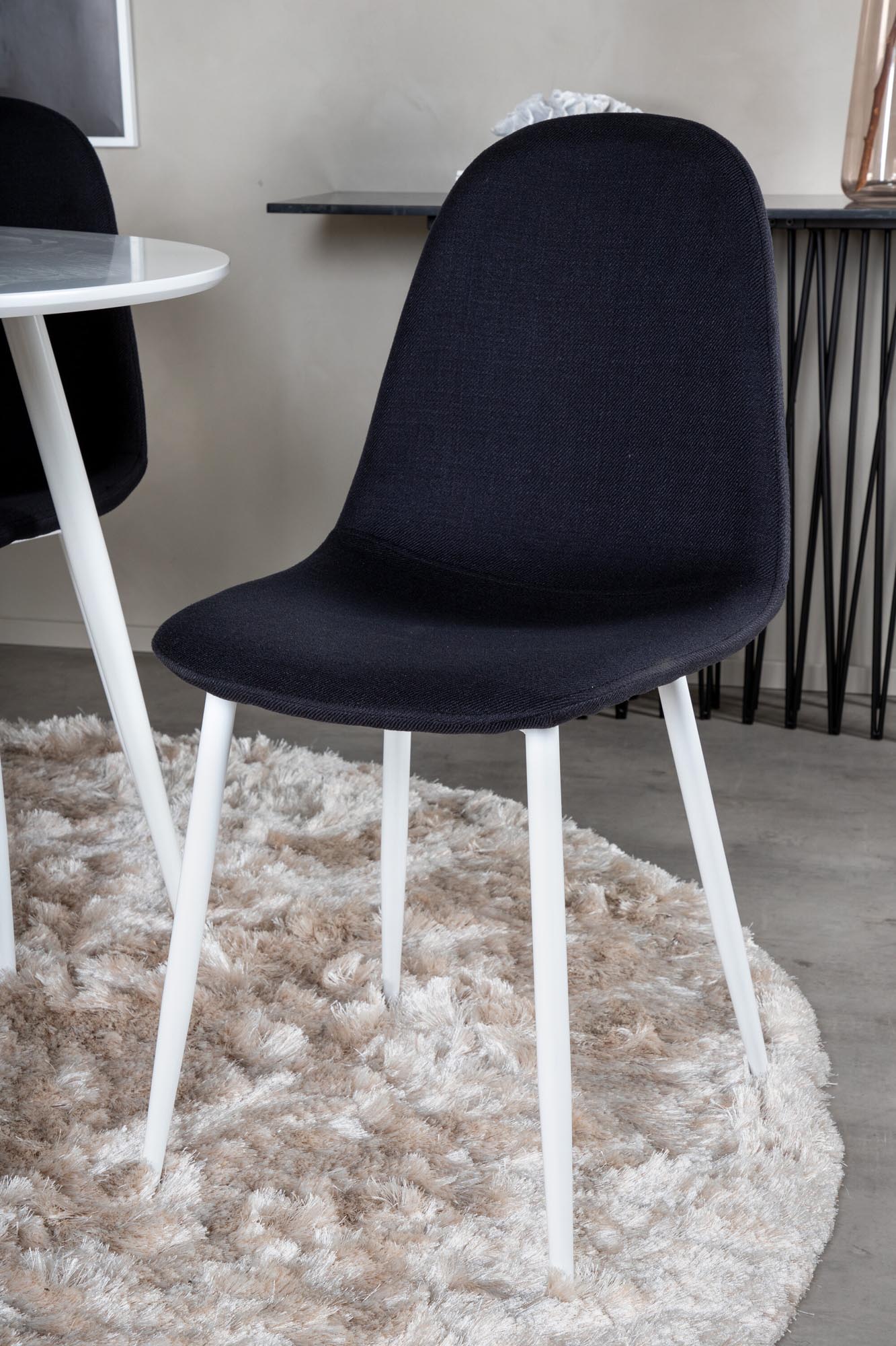 Stilvolles Plaza Esszimmerset mit rundem 100 cm Tisch und 4 eleganten Samtstühlen Polar für gemütliche Essrunden und luxuriöse Atmosphäre.