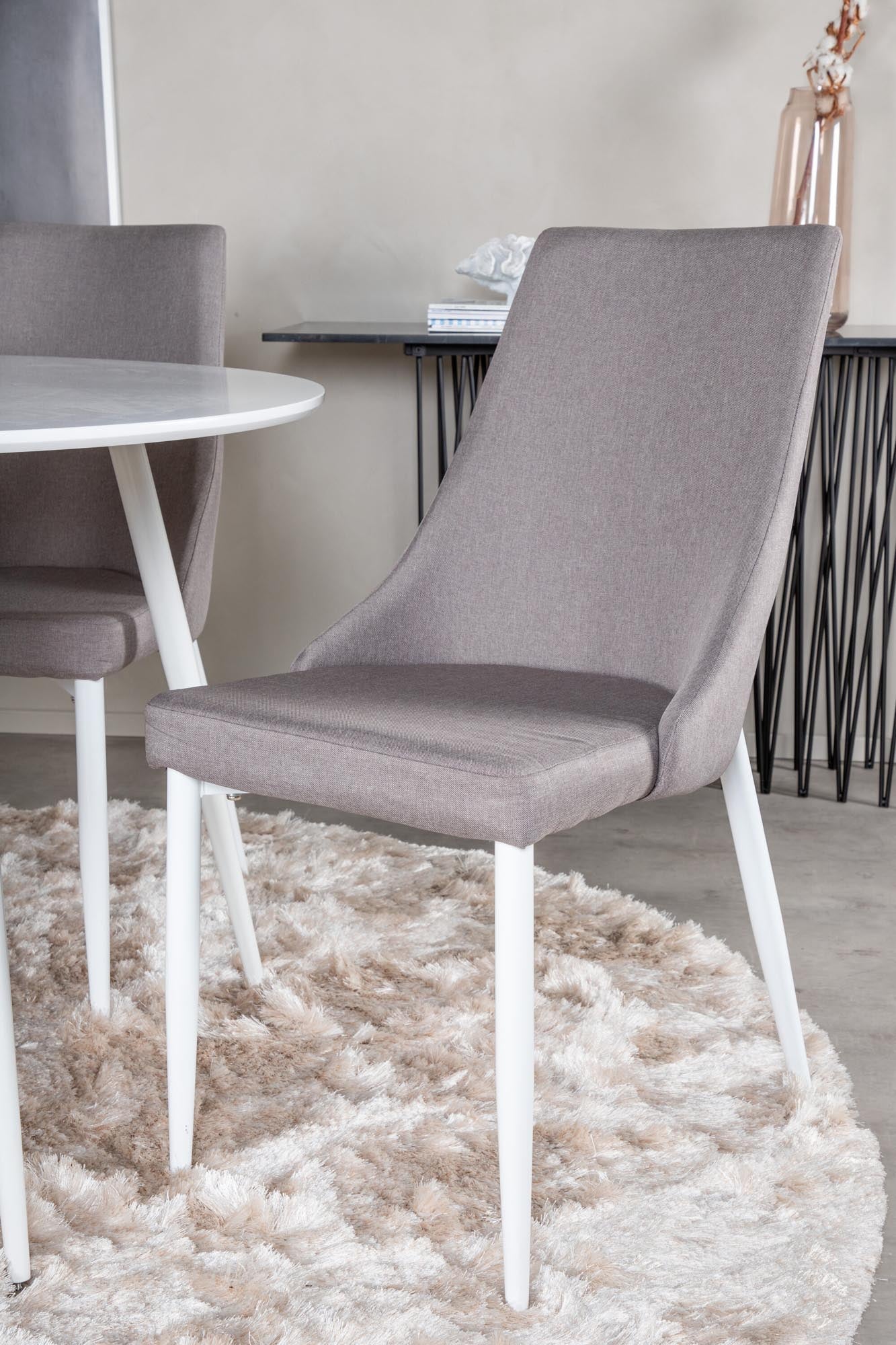 Elegantes Esszimmerset Plaza mit Leone Stühlen, 100 cm Durchmesser, ideal für gesellige Abende und stilvolle Einrichtung. Hochwertige Materialien.