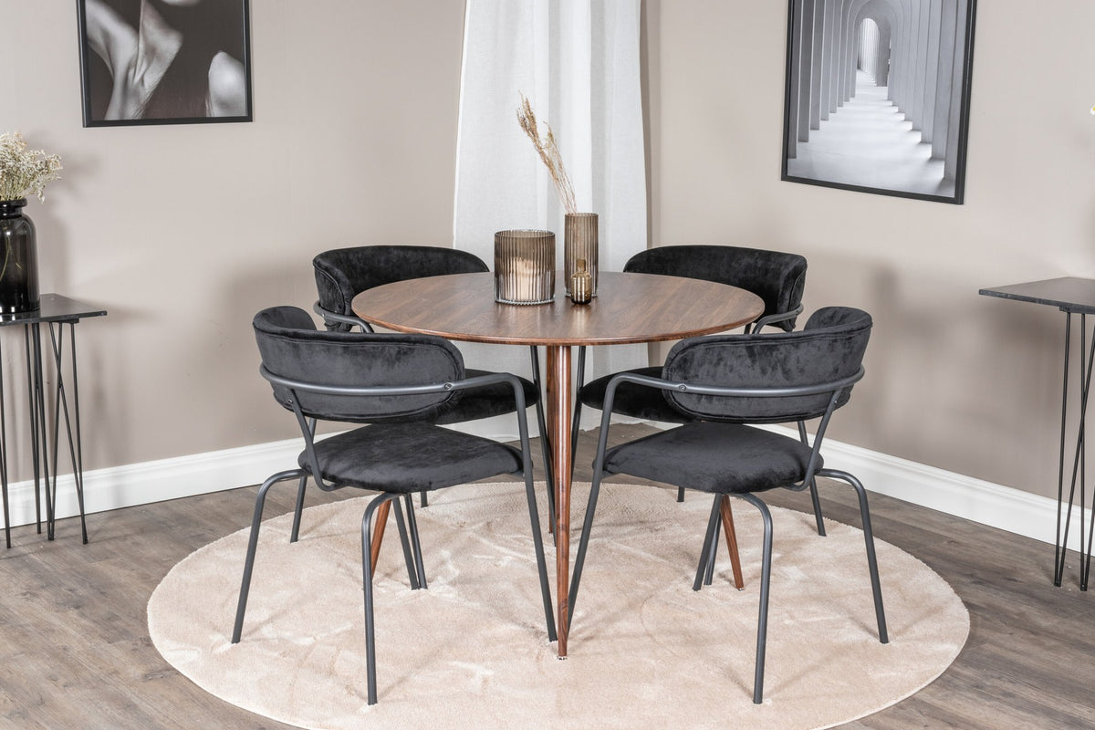 Rundes Esszimmerset zeigt Holztisch mit Nussbaum-Platte ⌀100 cm und zwei schwarze Stühle aus MDF und Stahl mit Samtbezug.