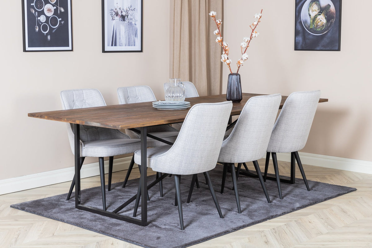 Esszimmerset Padang mit Teak-Esstisch und Velvet Deluxe Stühlen in Blau, Stahlgestell schwarz pulverbeschichtet, Polyesterbezug.