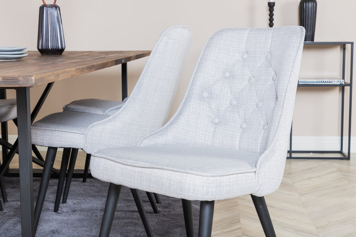 Esszimmerset Padang mit Teak-Esstisch und Velvet Deluxe Stühlen in Blau, Stahlgestell schwarz pulverbeschichtet, Polyesterbezug.