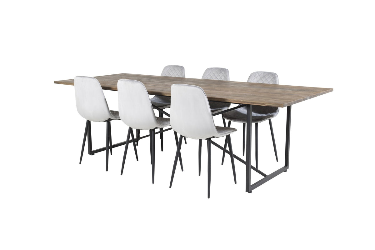 Esstisch mit Teak-Tischplatte in Natur und Stahlgestell, dazu Stühle mit schwarzem Stahlrahmen und grauem Polyester-Samt-Bezug.