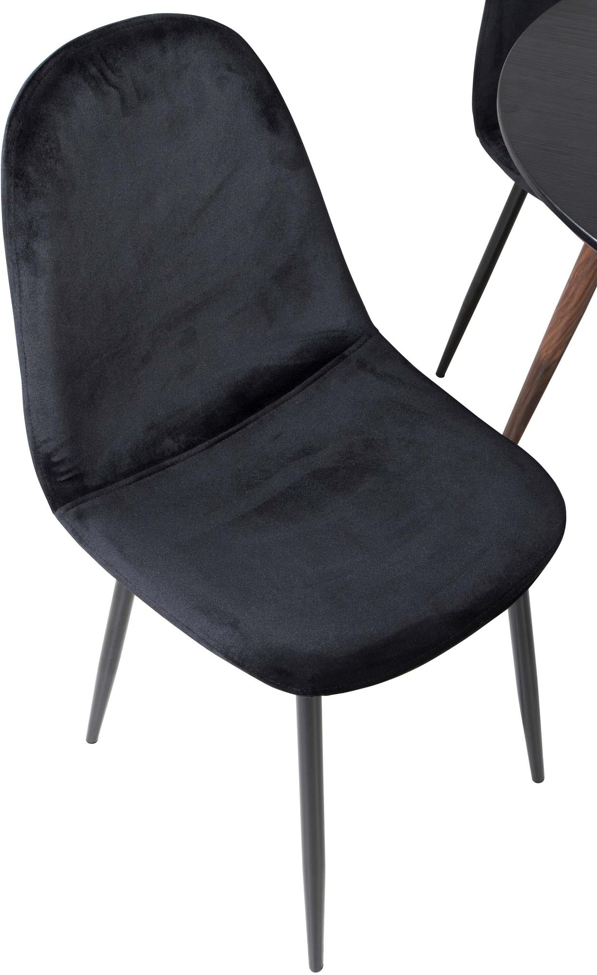 Stilvolles Plaza Esszimmerset mit rundem 100 cm Tisch und 4 Samtstühlen Polar. Perfekt für gesellige Abende und elegantes Ambiente.