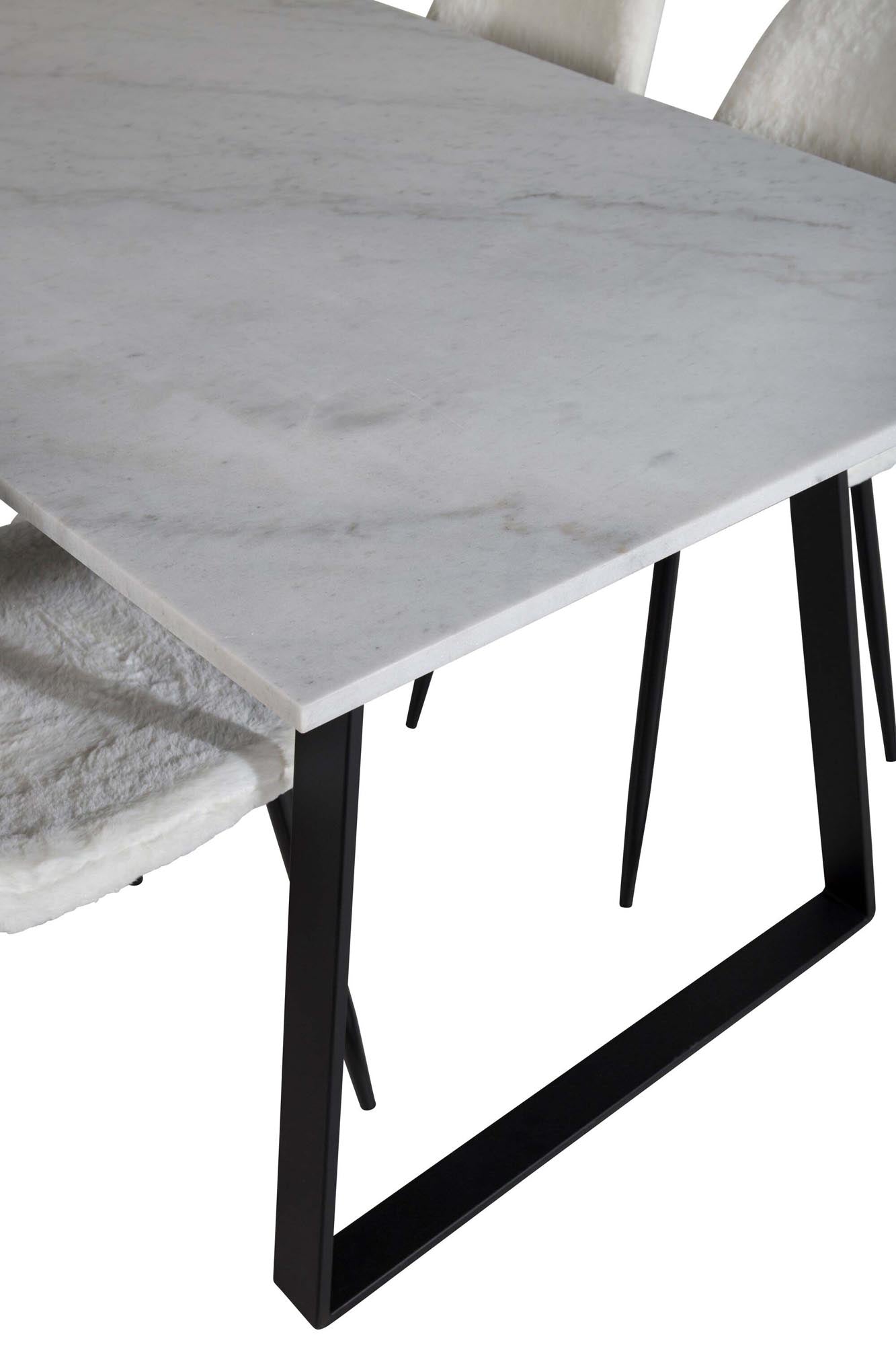 Entdecken Sie das elegante Esszimmerset Estelle + Polar: Ein moderner Tisch und luxuriöse Stühle für gemütliche Abende in stilvollem Ambiente.