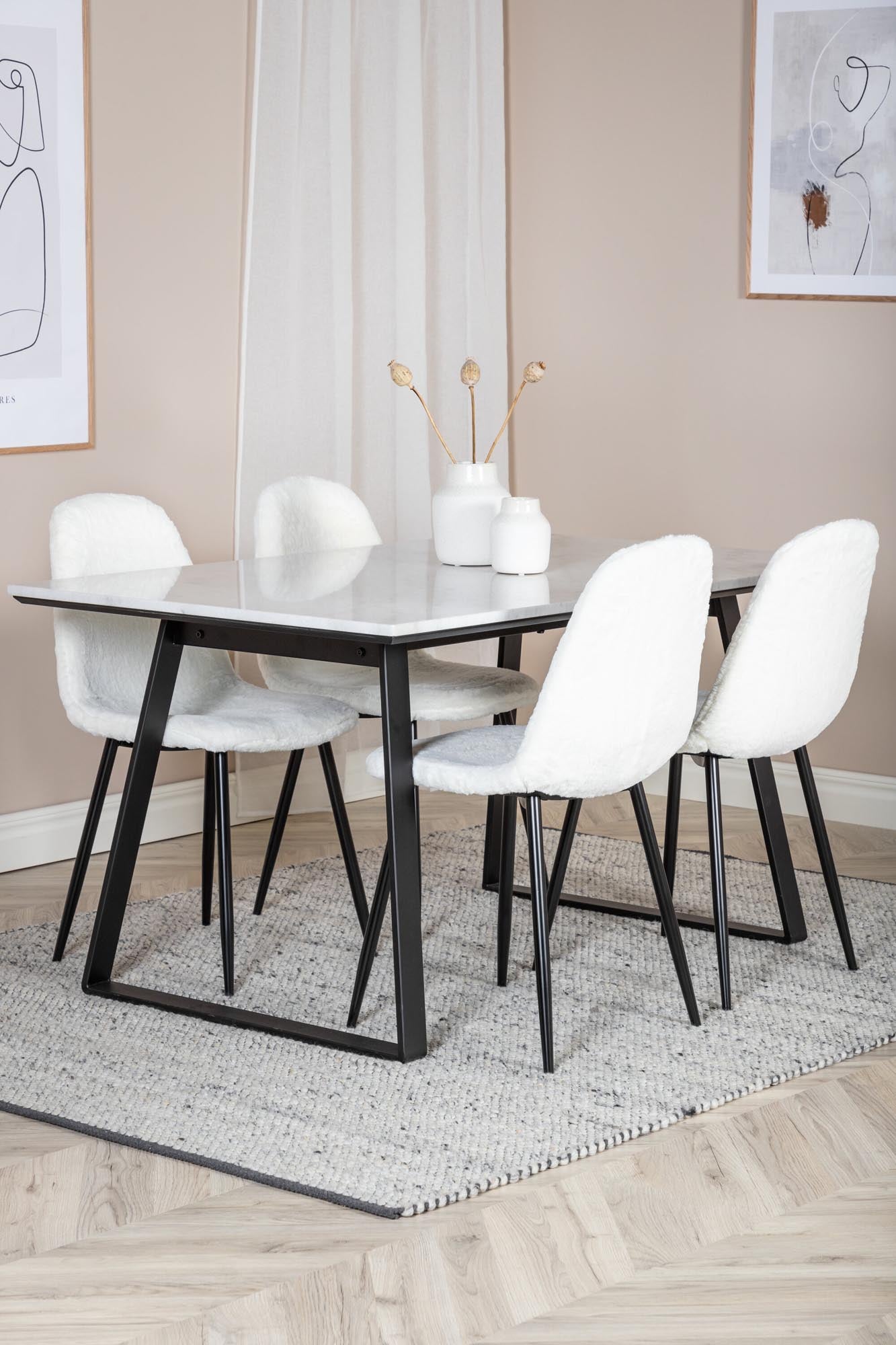 Entdecken Sie das Estelle Esszimmerset + Polar: Moderner Esstisch und bequeme Samtstühle für einladende Dinnerabende.