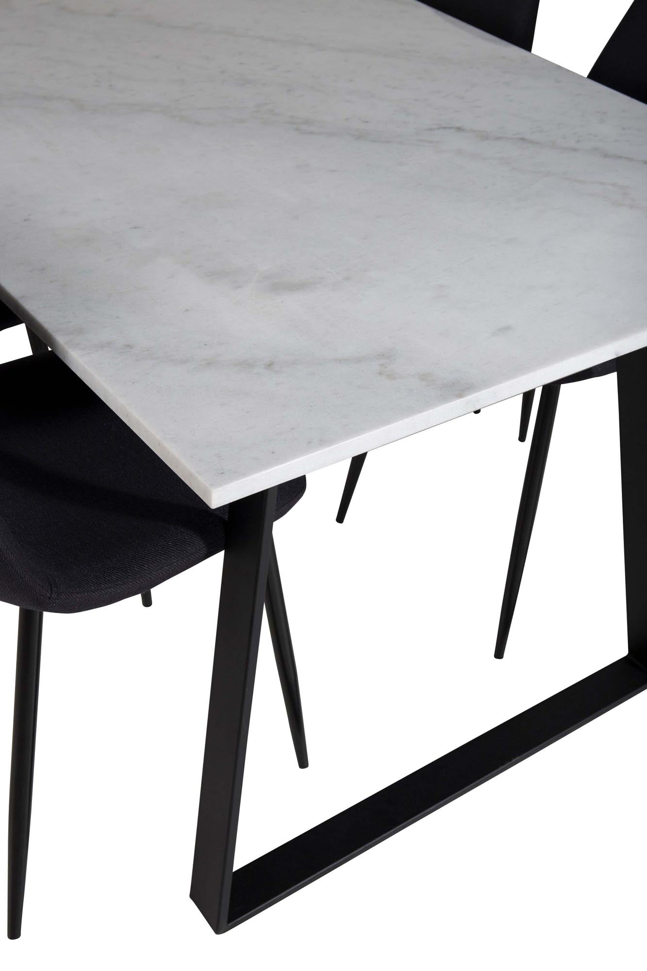 Entdecken Sie das elegante Esszimmerset Estelle + Polar von Venture Home: Ein moderner Tisch und luxuriöse Stühle für gemütliche Essenszeiten.