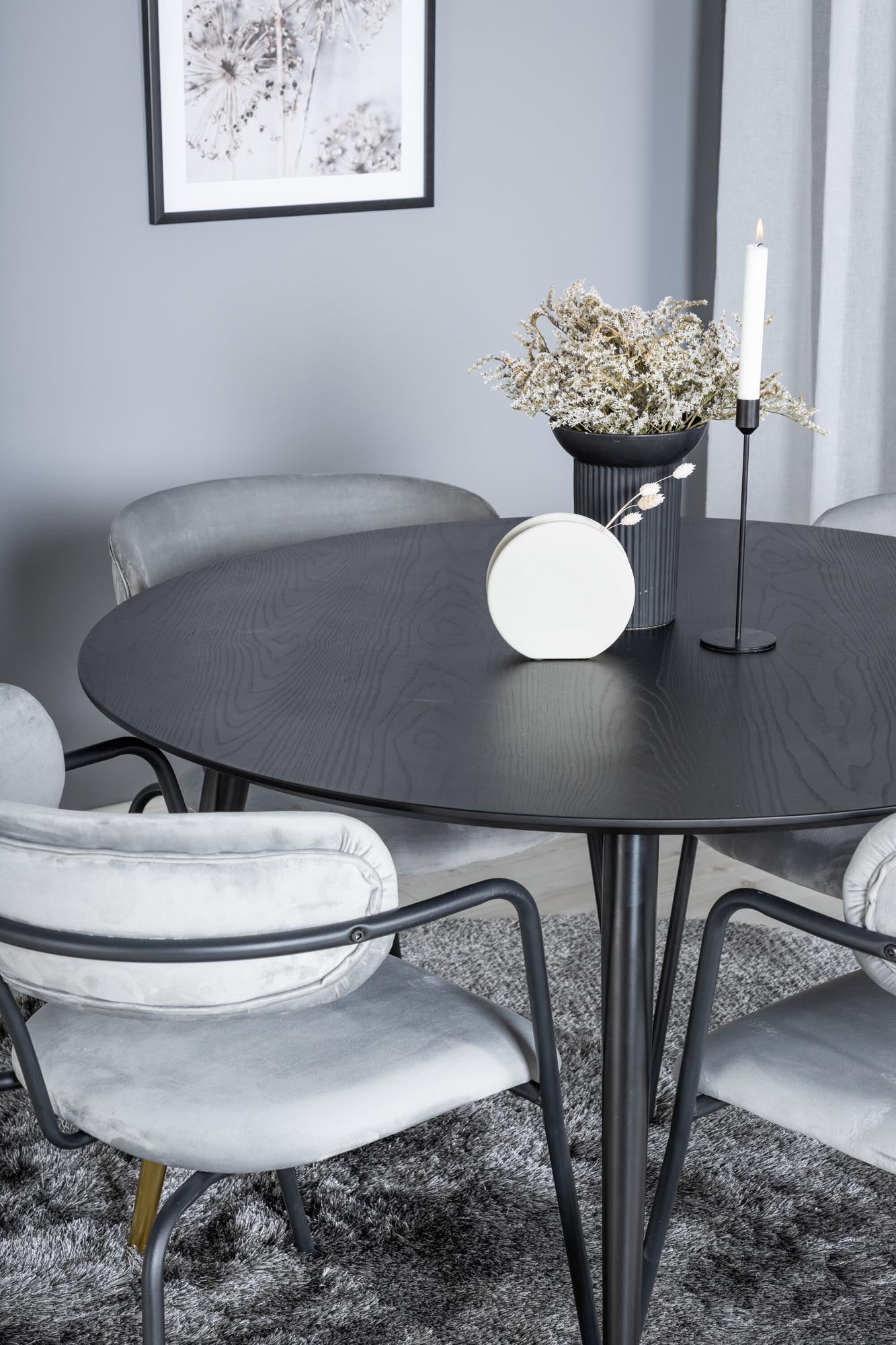 Erleben Sie das Dipp Esszimmerset + Arrow von Venture Home: Stilvoller runder Tisch und luxuriöse Samt-Stühle für unvergessliche Momente.